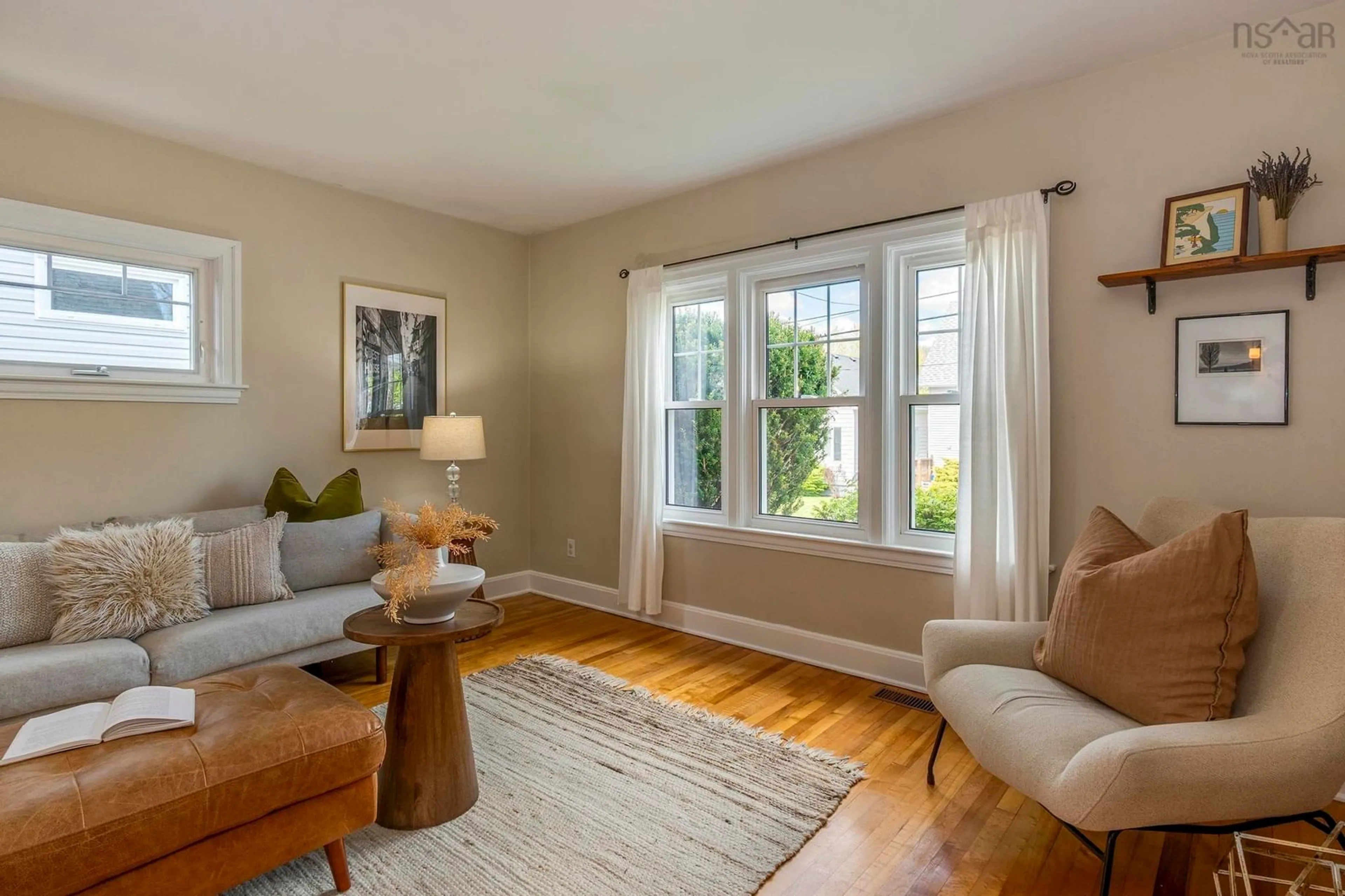 Living room with furniture, wood/laminate floor for 42 Esdaile Ave, Dartmouth Nova Scotia B2Y 3N6