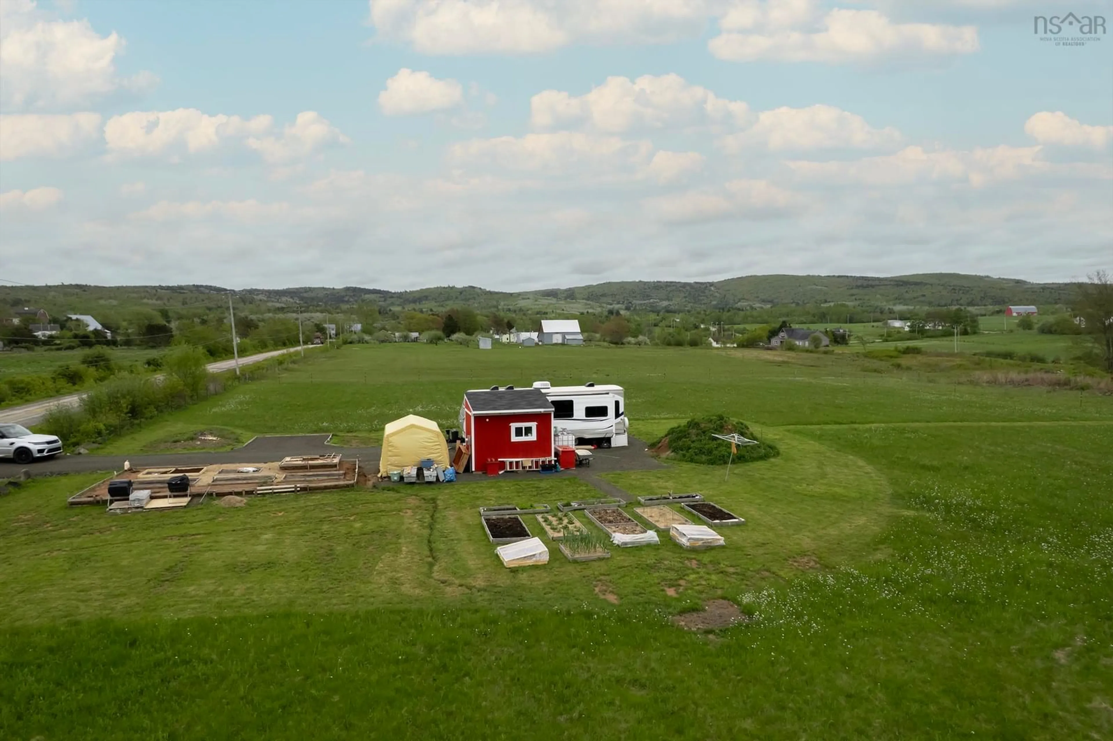 A pic from outside/outdoor area/front of a property/back of a property/a pic from drone, mountain view for 81 Brickyard Rd, Carleton Corner Nova Scotia B0S 1C0