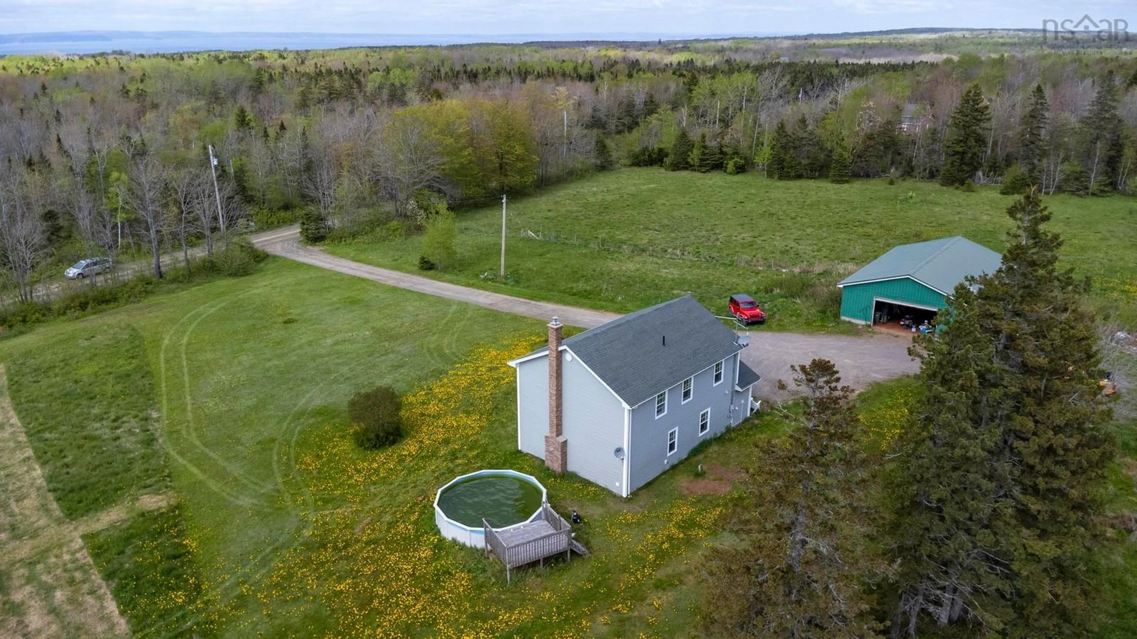 A pic from outside/outdoor area/front of a property/back of a property/a pic from drone, water/lake/river/ocean view for 3404 Brow Of Mountain Rd, West Black Rock Nova Scotia B0P 1V0