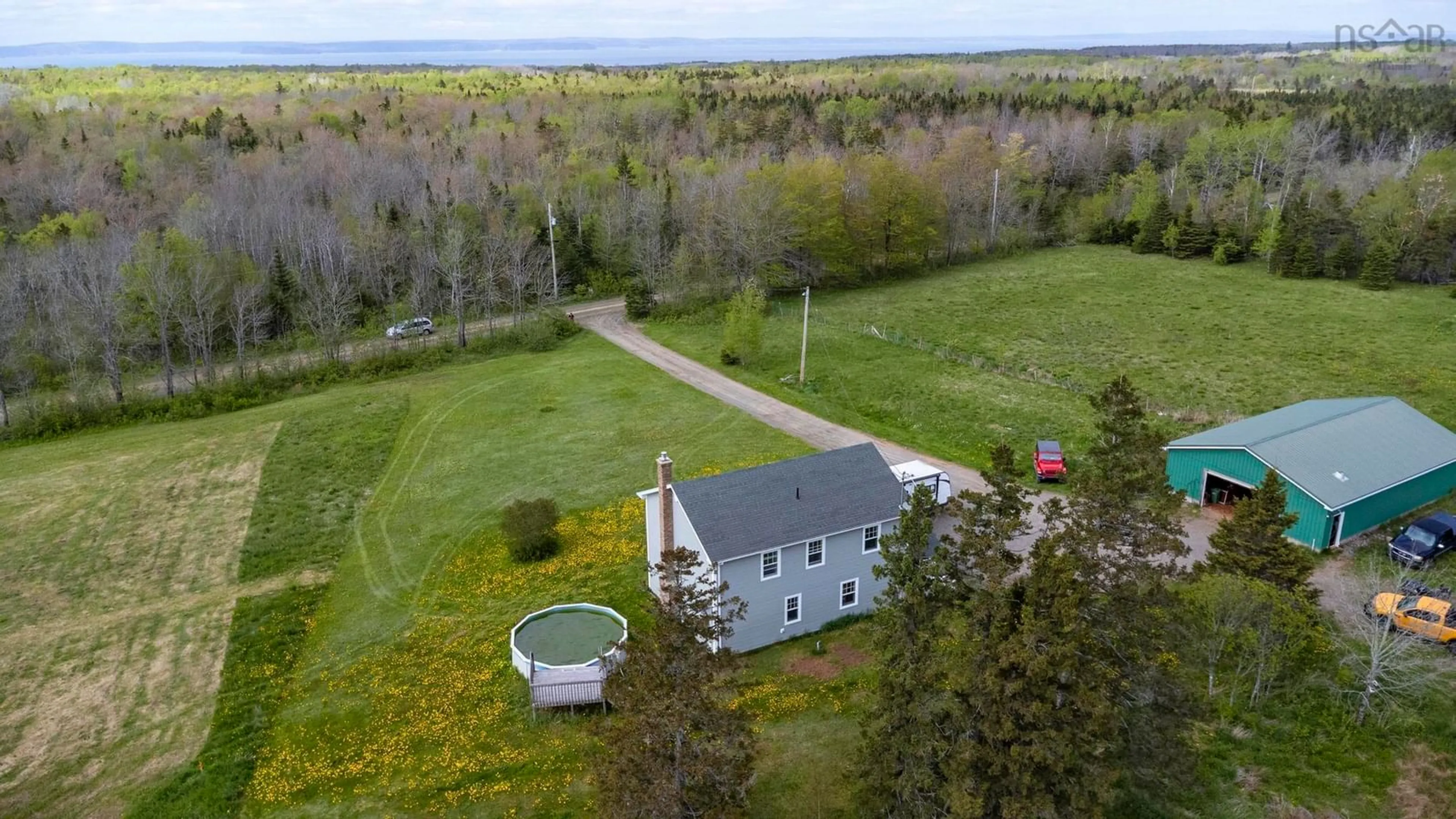 A pic from outside/outdoor area/front of a property/back of a property/a pic from drone, water/lake/river/ocean view for 3404 Brow Of Mountain Rd, West Black Rock Nova Scotia B0P 1V0