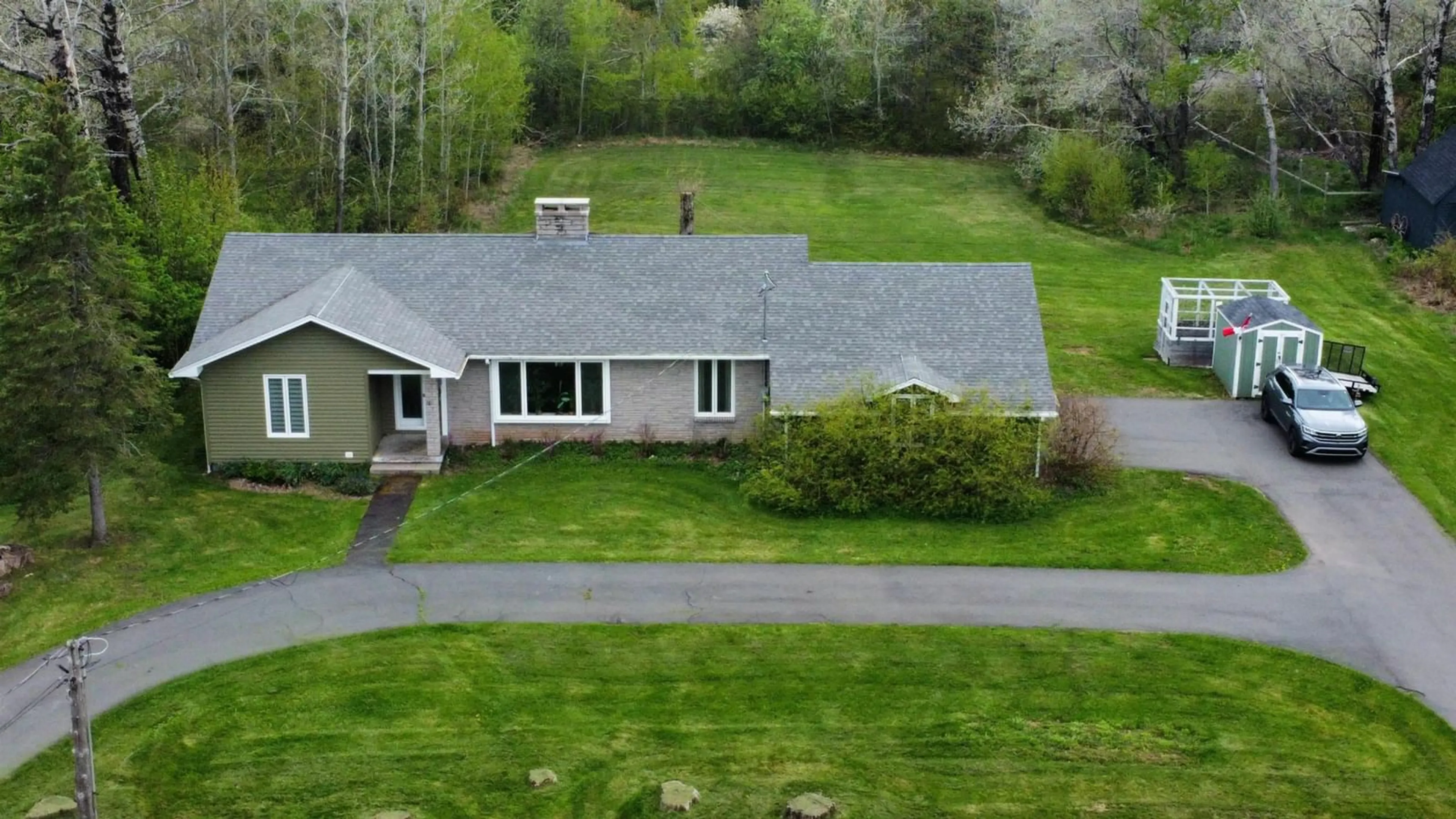 A pic from outside/outdoor area/front of a property/back of a property/a pic from drone, mountain view for 21 Mcdougal St, Springhill Nova Scotia B0M 1X0