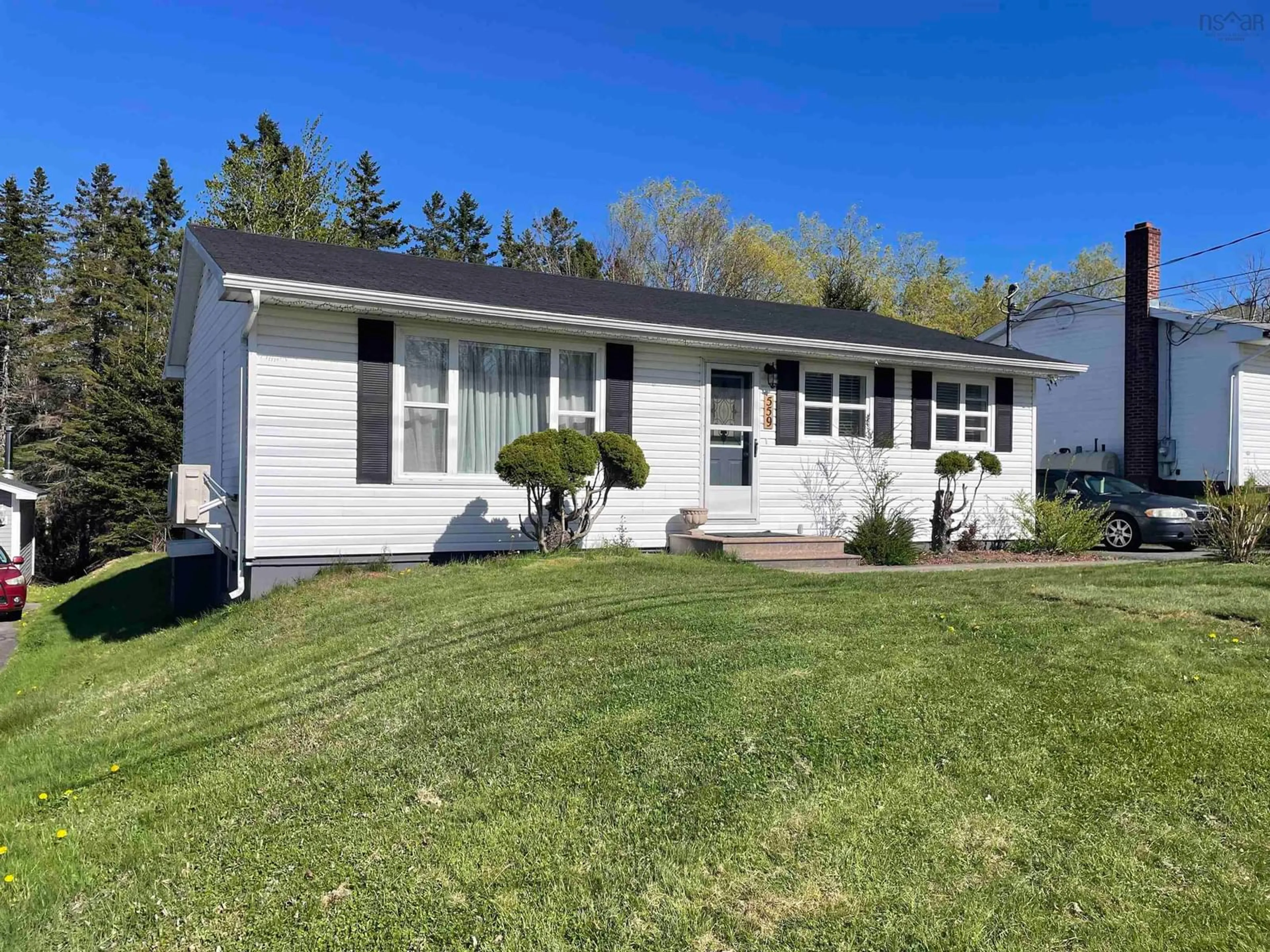 Home with vinyl exterior material, street for 559 Cottage Rd, Sydney Nova Scotia B1P 6S5