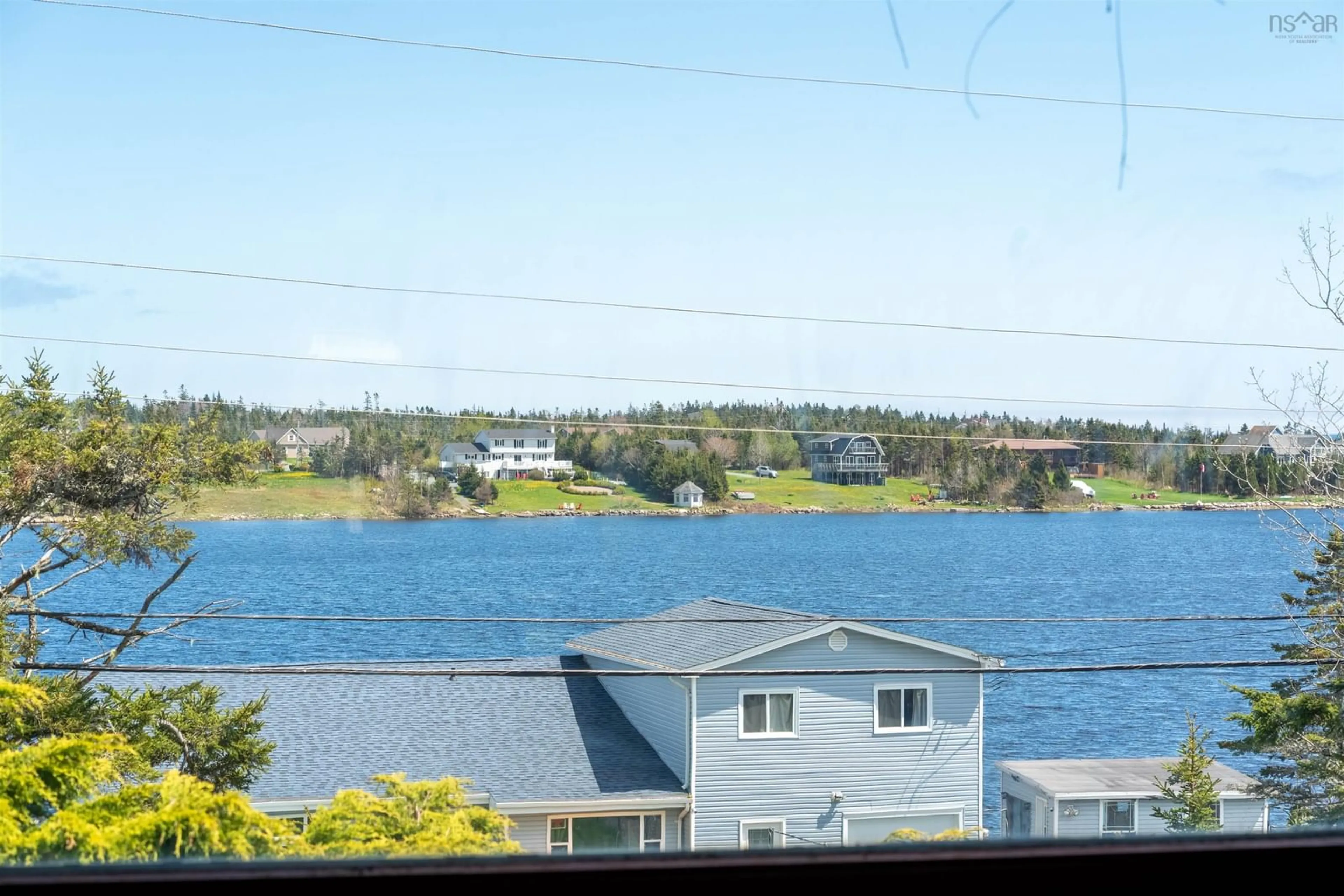 Patio, water/lake/river/ocean view for 2447 Crowell Rd, East Lawrencetown Nova Scotia B2Z 1P5