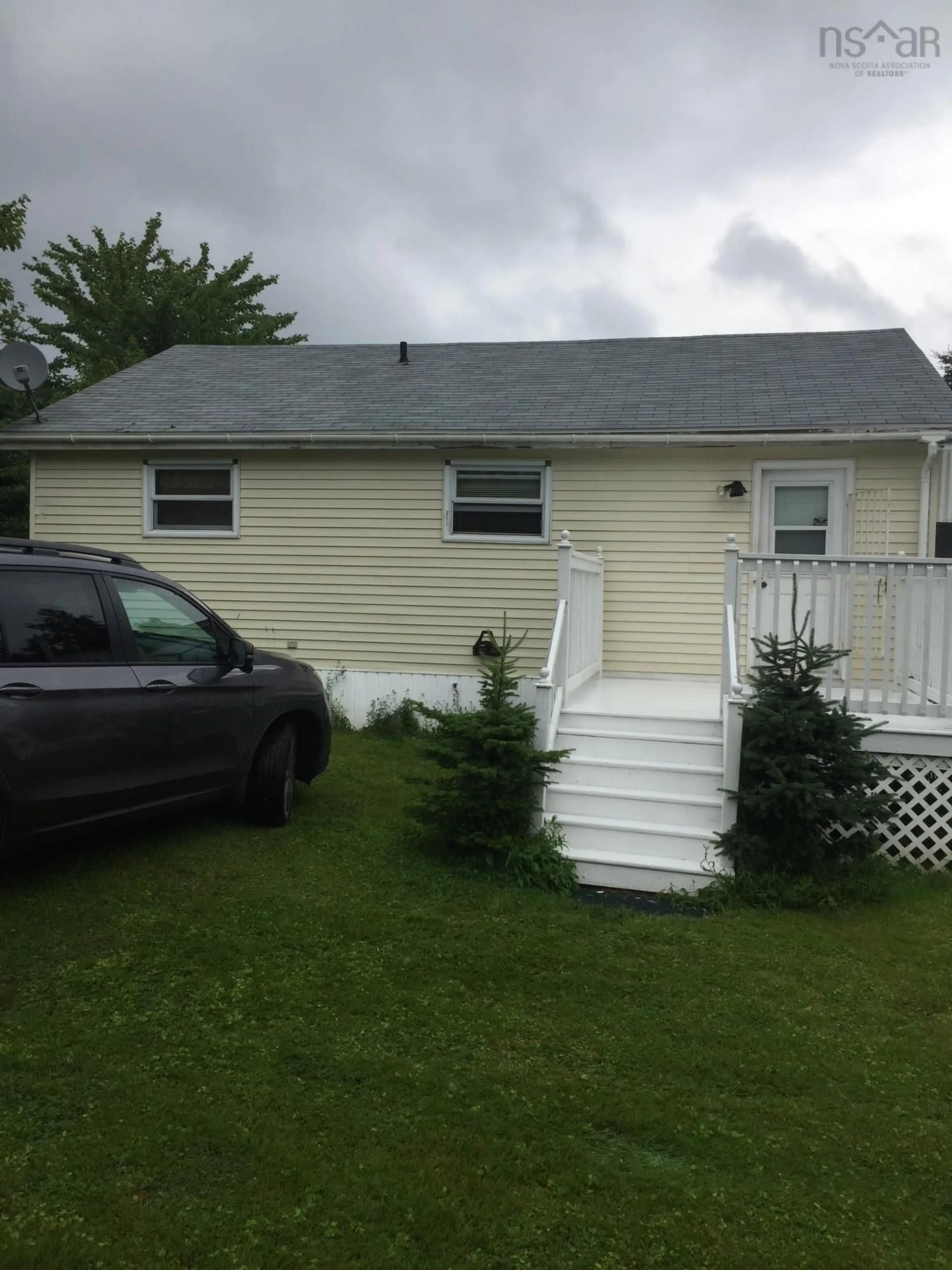Home with vinyl exterior material, street for 130 Woods Rd, Benacadie Nova Scotia B1T 1G6