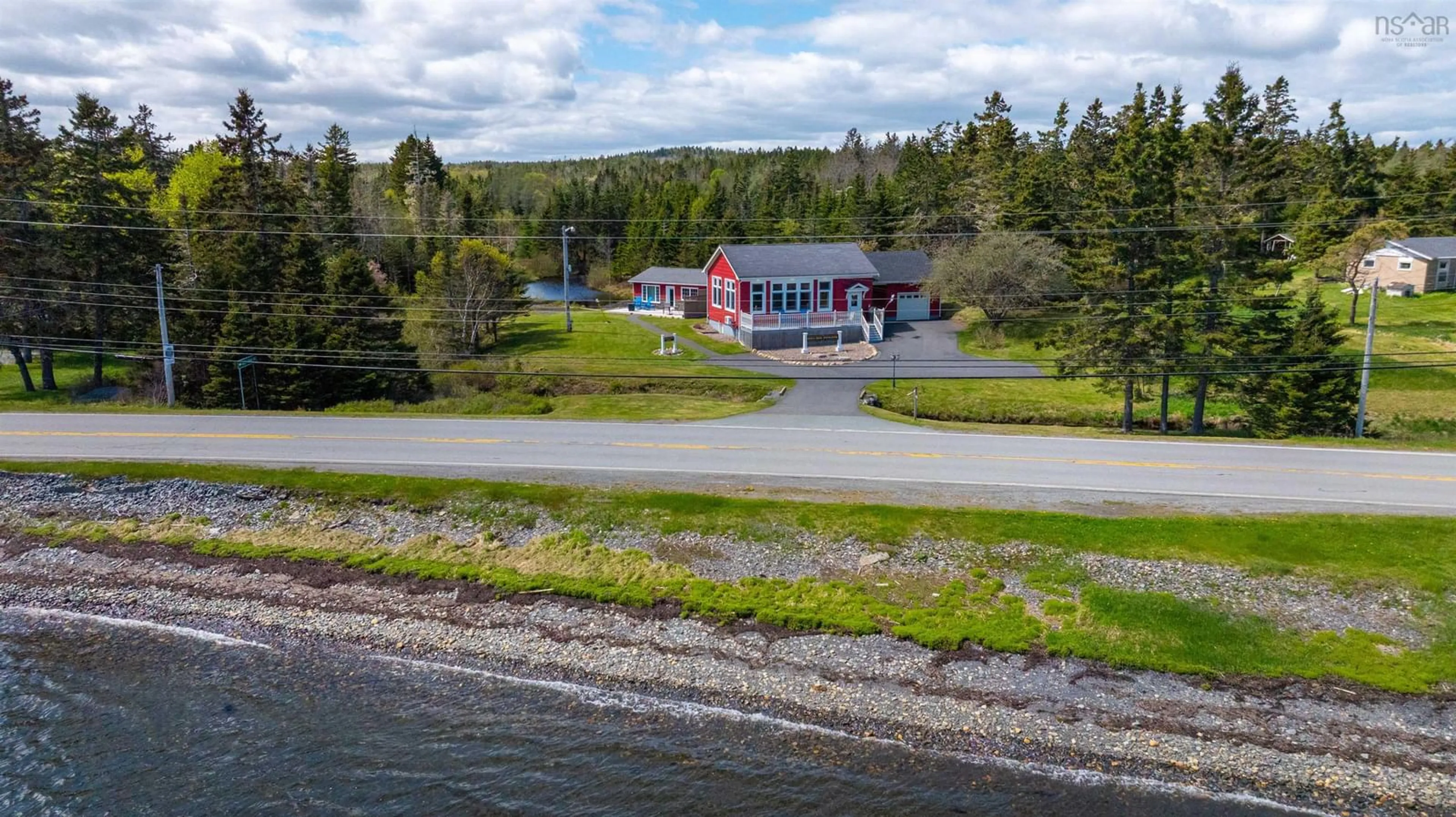 A pic from outside/outdoor area/front of a property/back of a property/a pic from drone, water/lake/river/ocean view for 4058 Highway 331, Dublin Shore Nova Scotia B0R 1C0