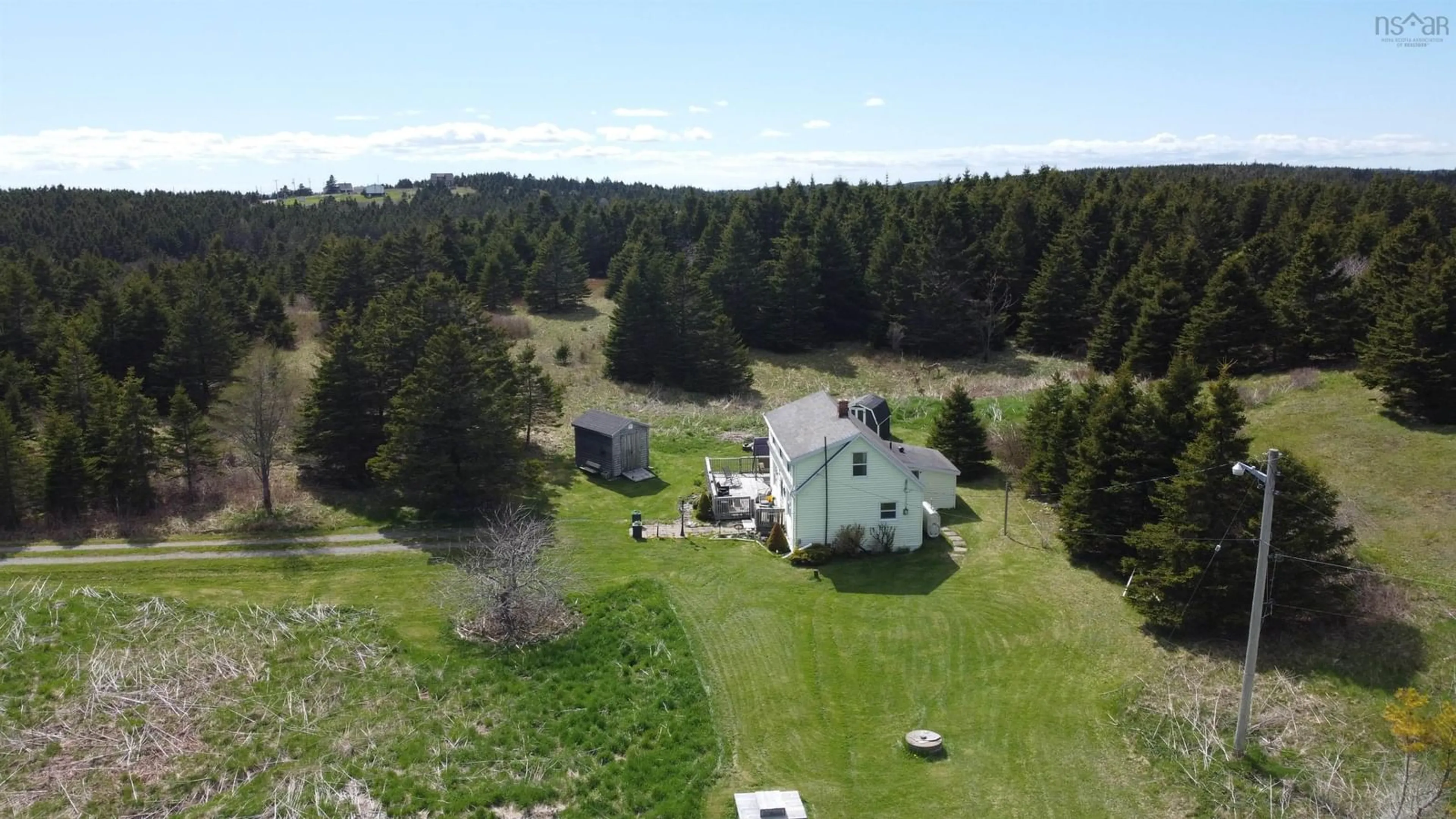 A pic from outside/outdoor area/front of a property/back of a property/a pic from drone, forest/trees view for 38 Lerues Lane, L'Ardoise Nova Scotia B0E 1S0