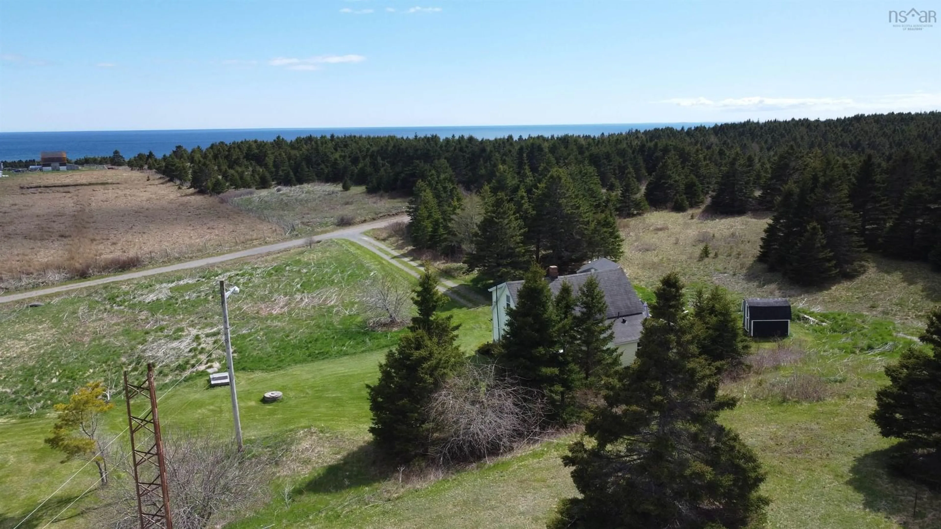 A pic from outside/outdoor area/front of a property/back of a property/a pic from drone, water/lake/river/ocean view for 38 Lerues Lane, L'Ardoise Nova Scotia B0E 1S0