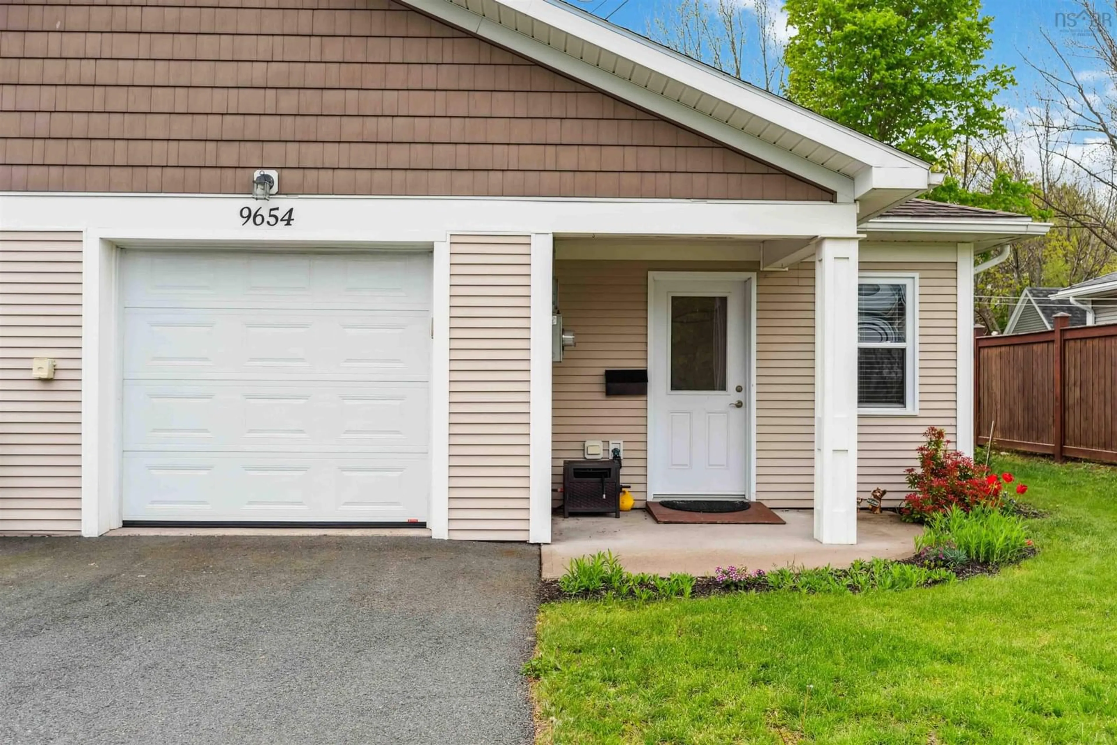 Home with vinyl exterior material, street for 9654 Commercial St, New Minas Nova Scotia B4N 3G4