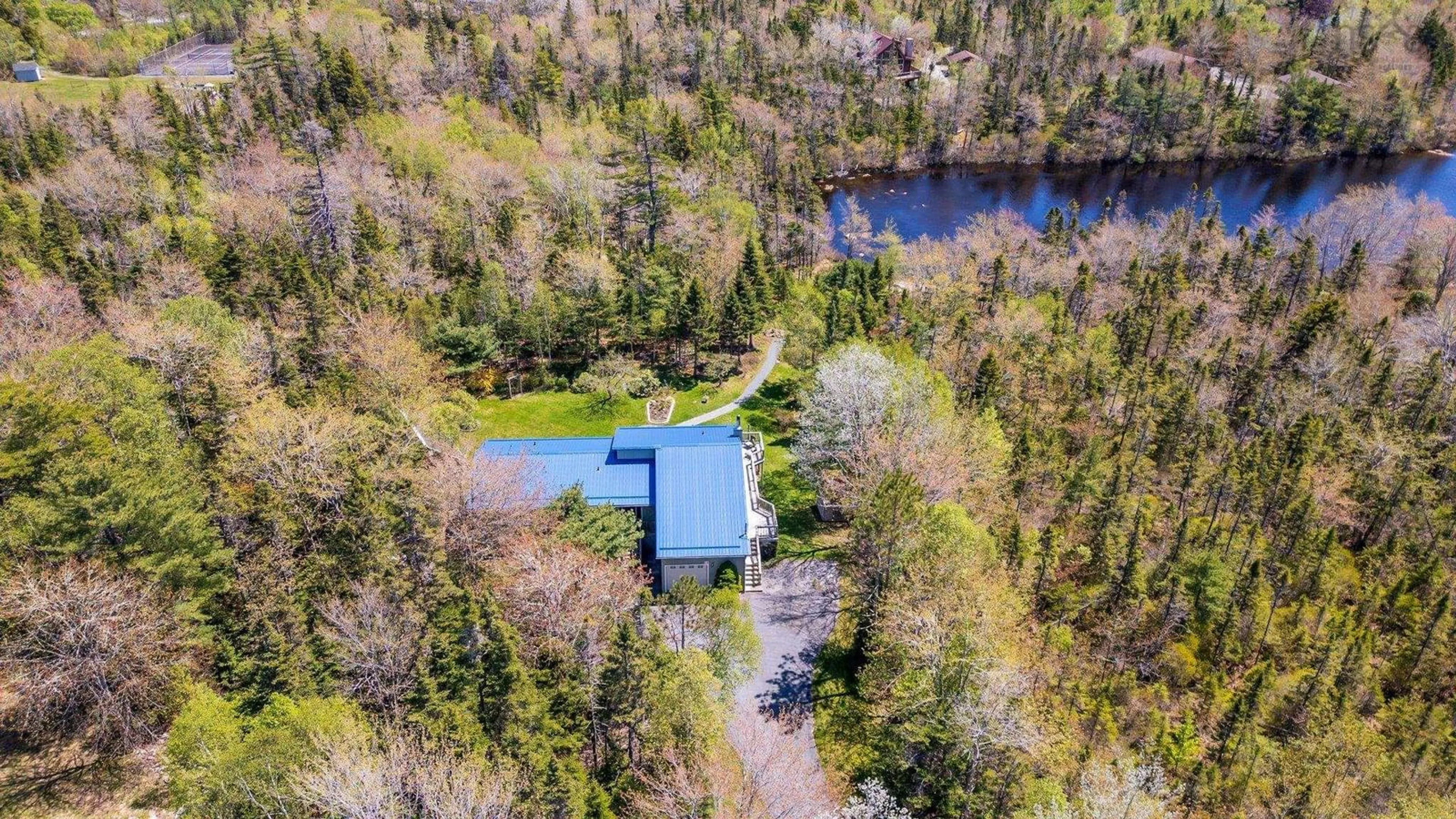 A pic from outside/outdoor area/front of a property/back of a property/a pic from drone, water/lake/river/ocean view for 50 Woodland Cres, Hubley Nova Scotia B3Z 1A9