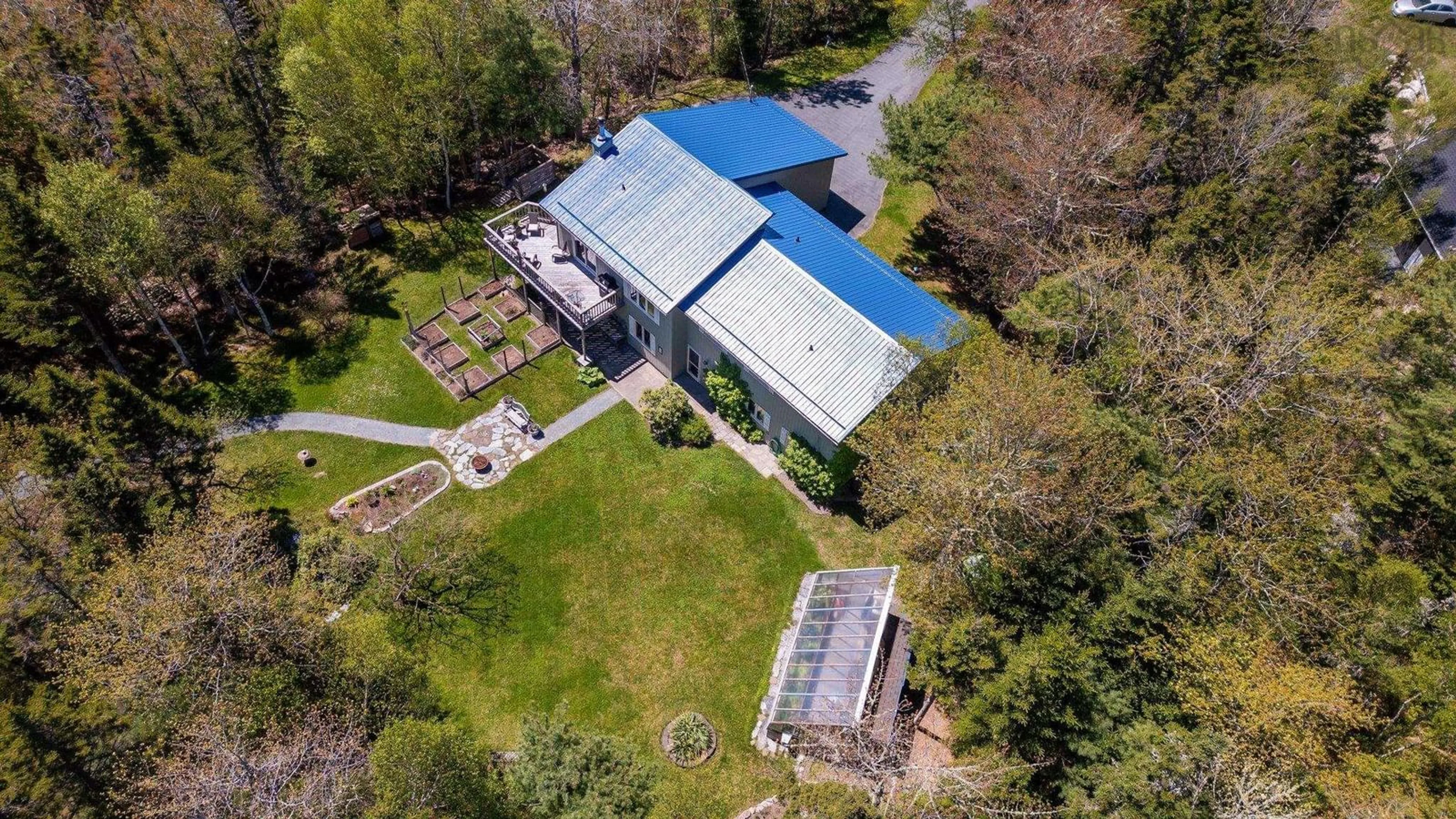 A pic from outside/outdoor area/front of a property/back of a property/a pic from drone, building for 50 Woodland Cres, Hubley Nova Scotia B3Z 1A9