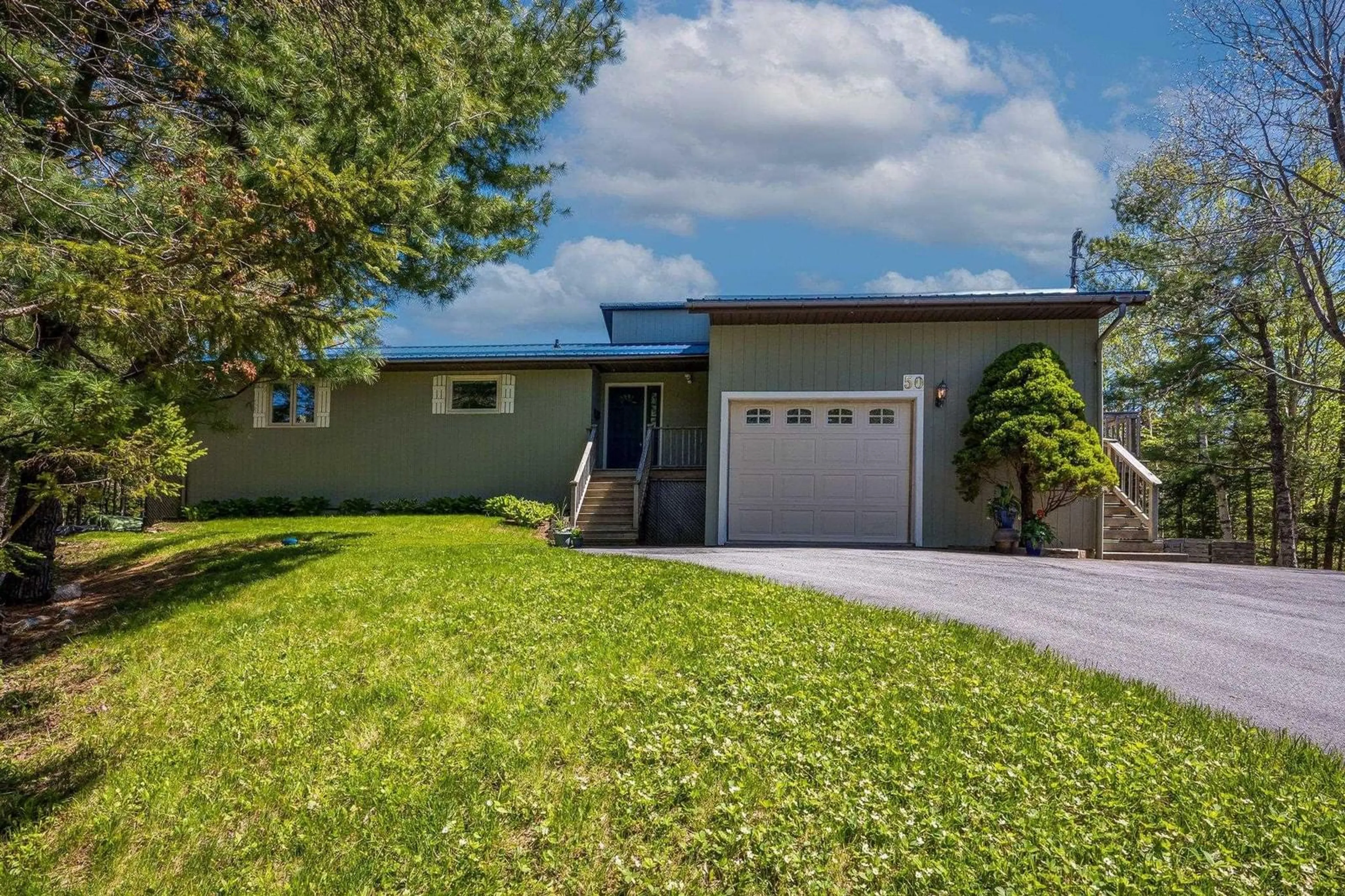 Home with vinyl exterior material, street for 50 Woodland Cres, Hubley Nova Scotia B3Z 1A9