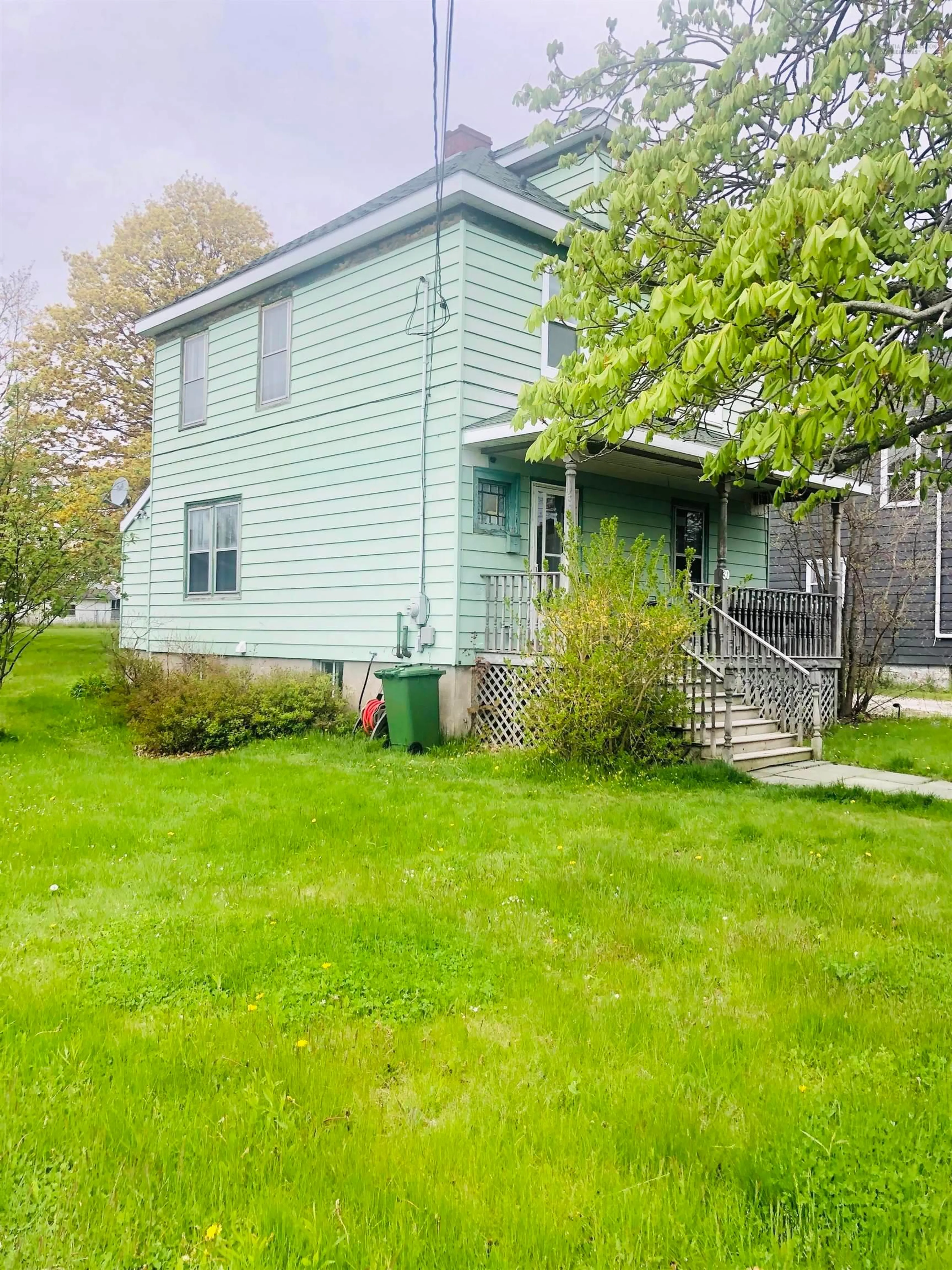 Home with vinyl exterior material, street for 30 Beacon St, North Sydney Nova Scotia B2A 1P9