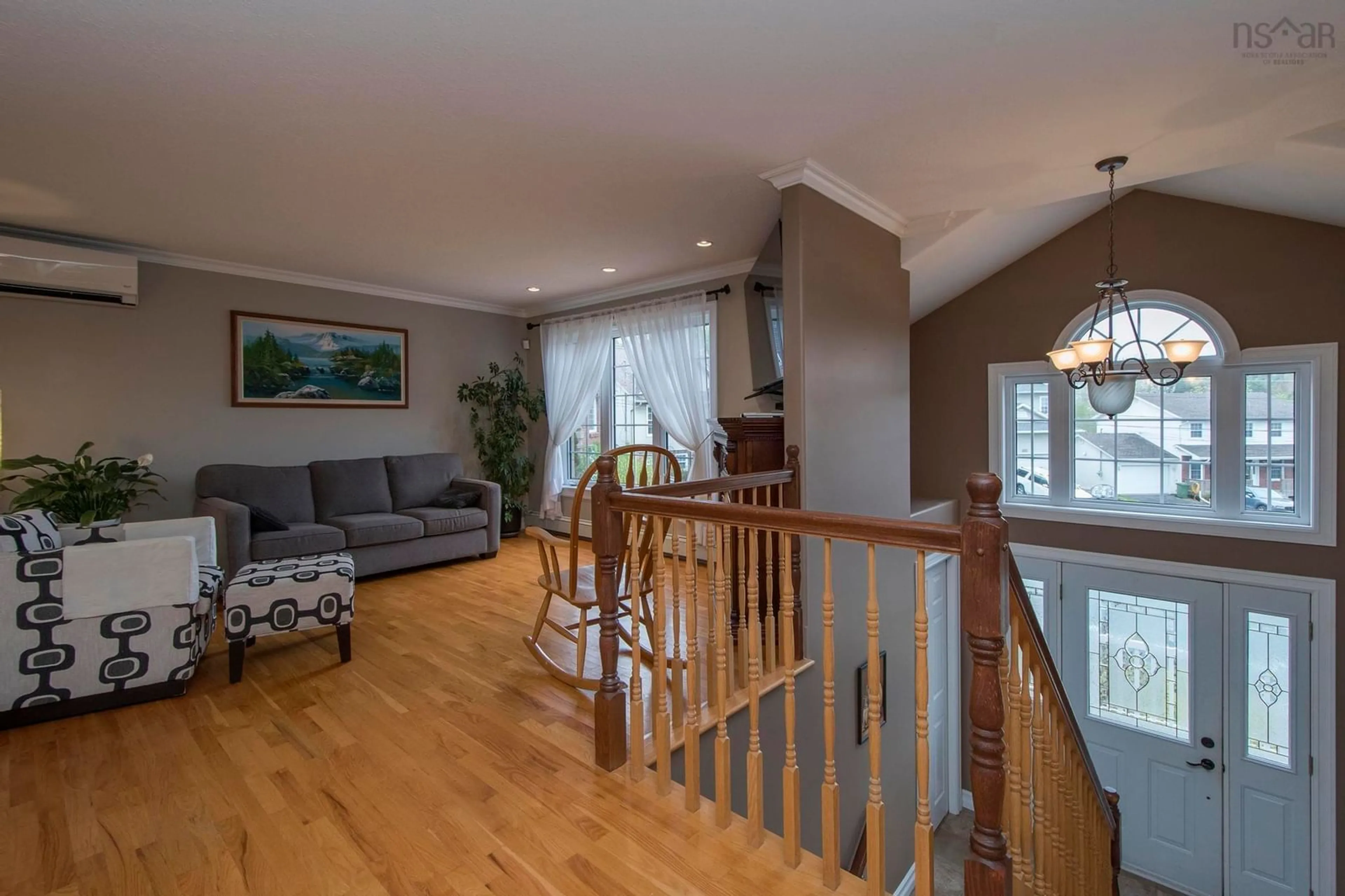 Living room with furniture, wood/laminate floor for 20 Pompano Crt, Dartmouth Nova Scotia B2X 3T2
