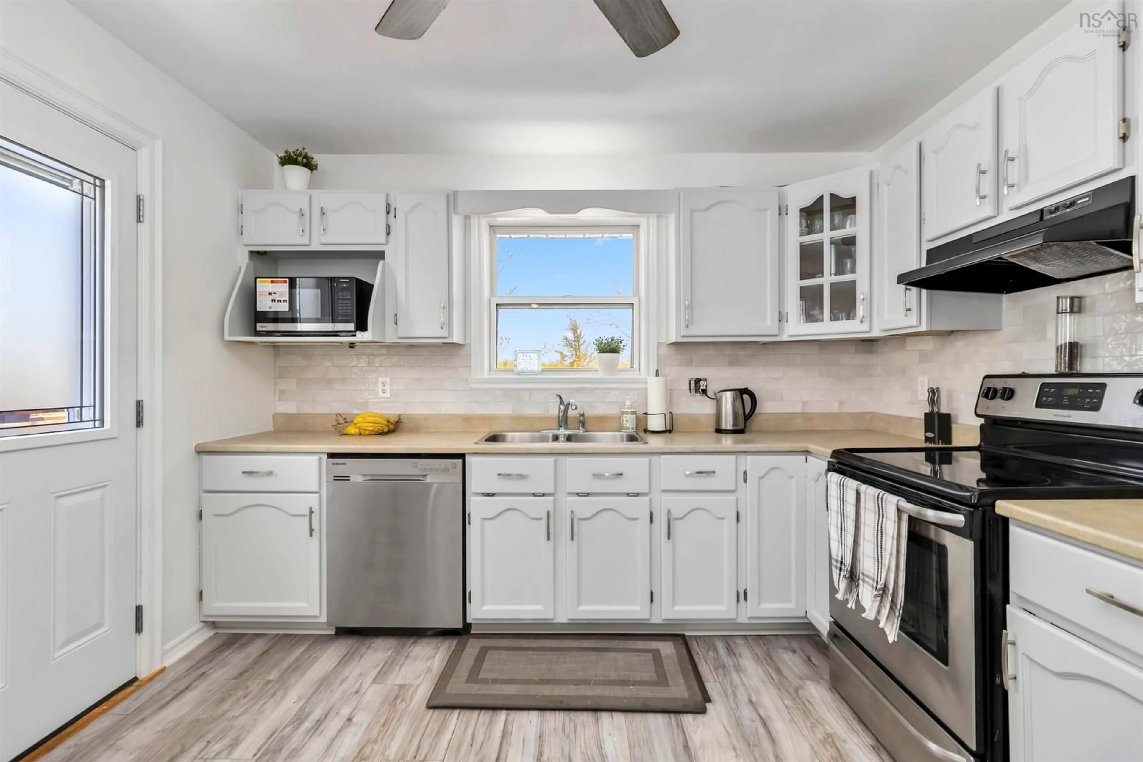 Open concept kitchen, ceramic/tile floor for 32 Thorncrest Crt, Eastern Passage Nova Scotia B3G 1N4