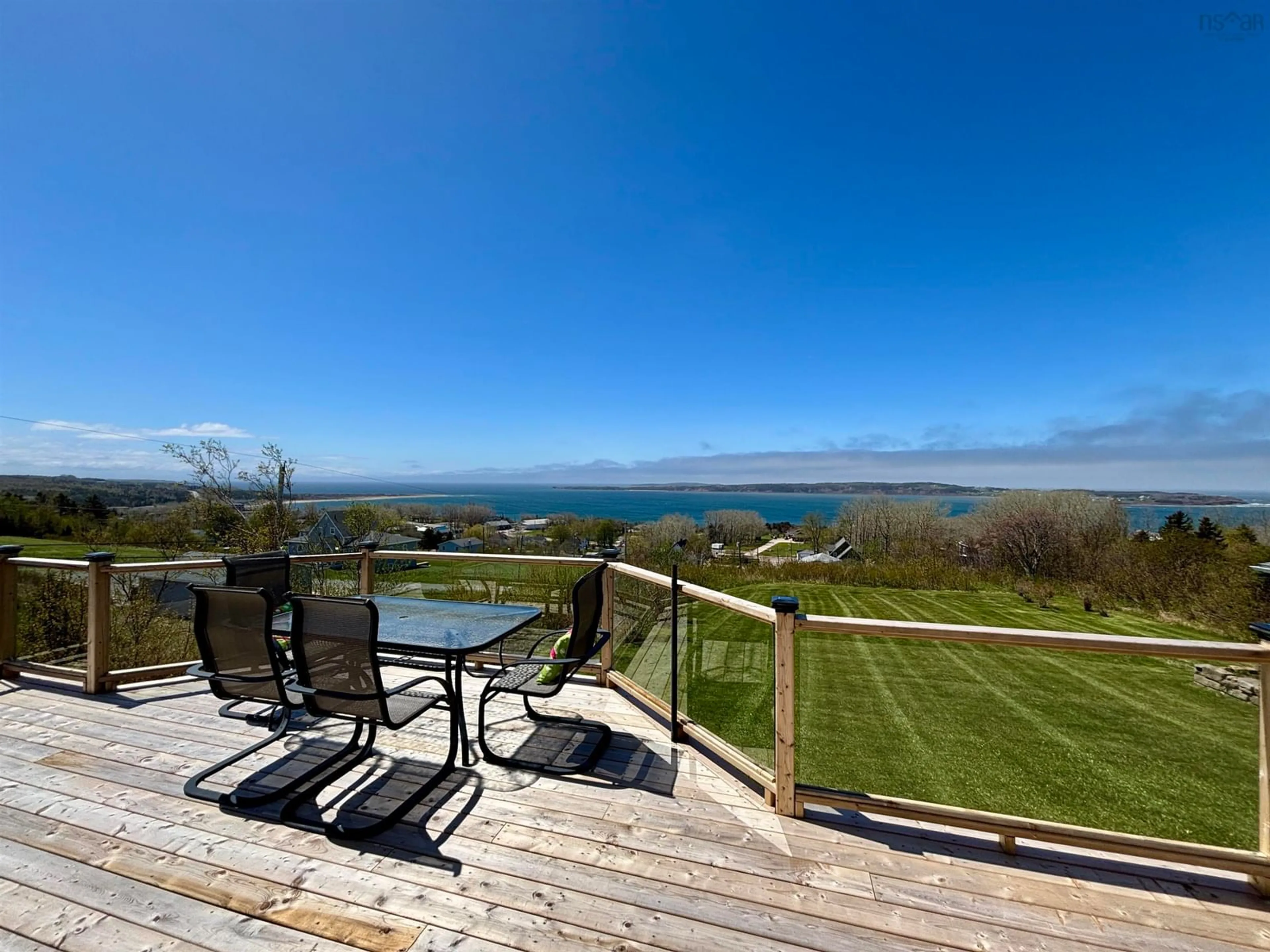 A pic from outside/outdoor area/front of a property/back of a property/a pic from drone, water/lake/river/ocean view for 147 Treuburg Lane, Port Hood Nova Scotia B0E 2W0