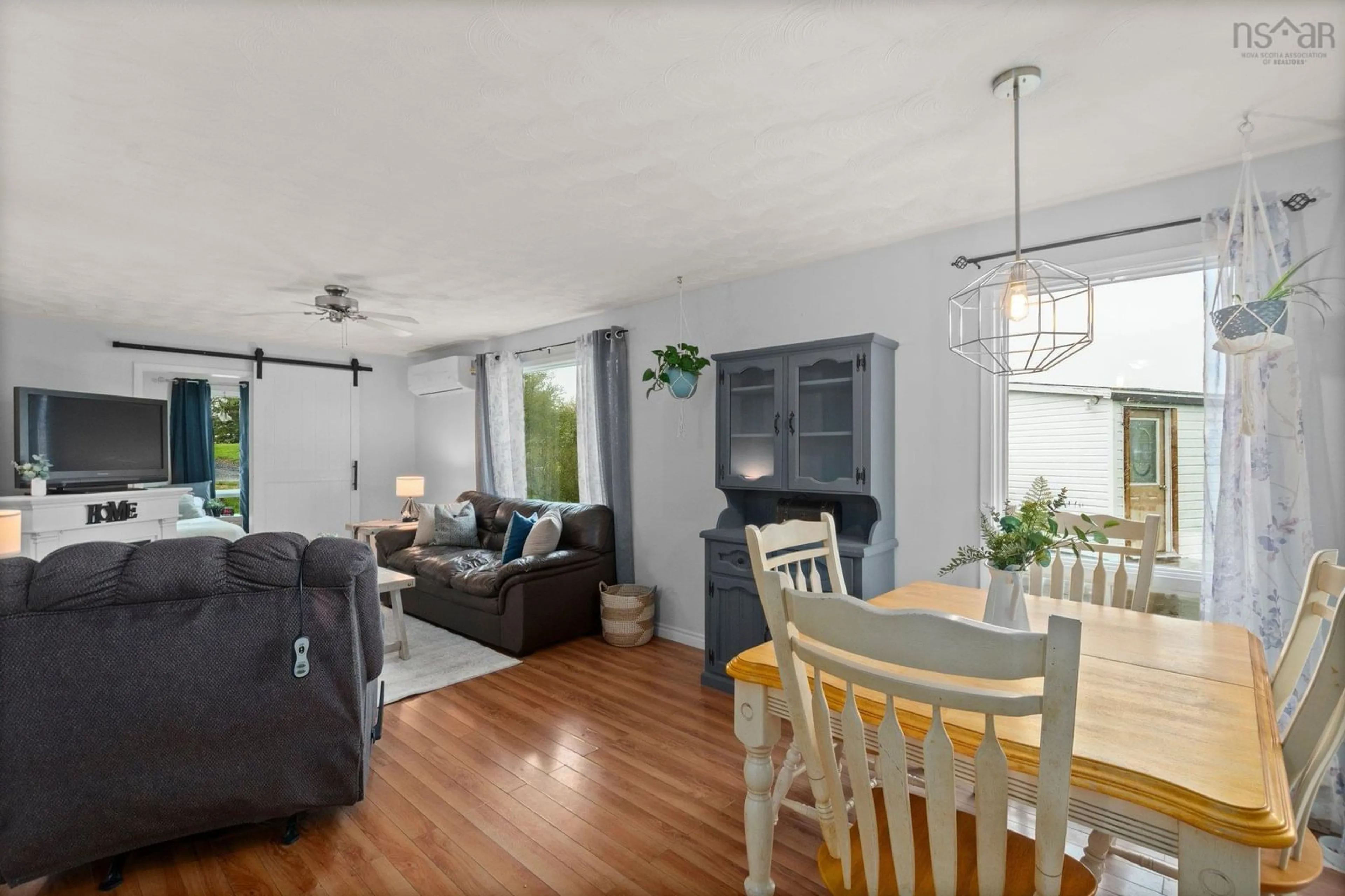 Living room with furniture, wood/laminate floor for 29 Back Gate Rd, Dutch Settlement Nova Scotia B2S 2H4