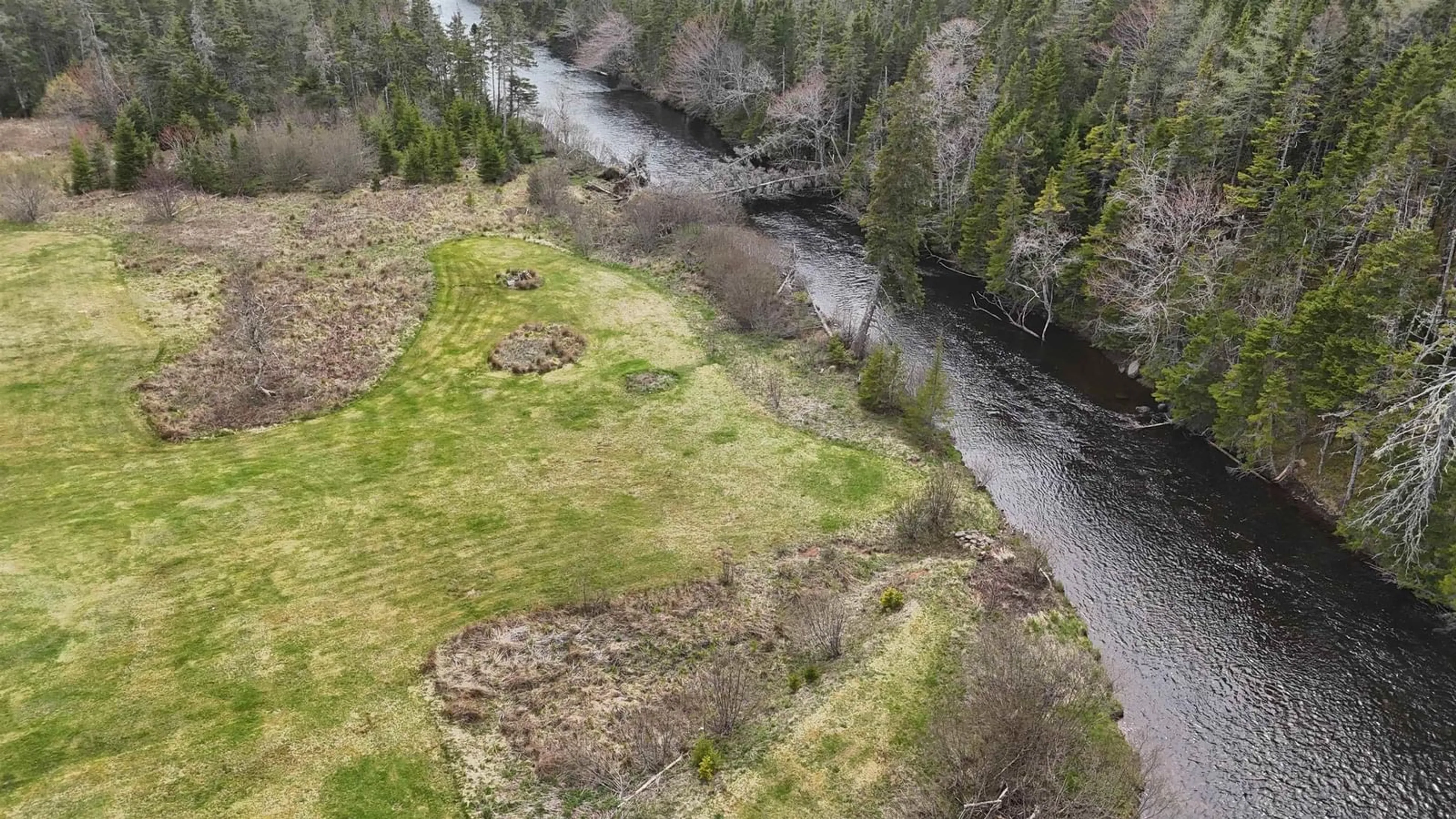 A pic from outside/outdoor area/front of a property/back of a property/a pic from drone, water/lake/river/ocean view for 1235 Loch Lomond Rd, Grand River Falls Nova Scotia B0E 1M0