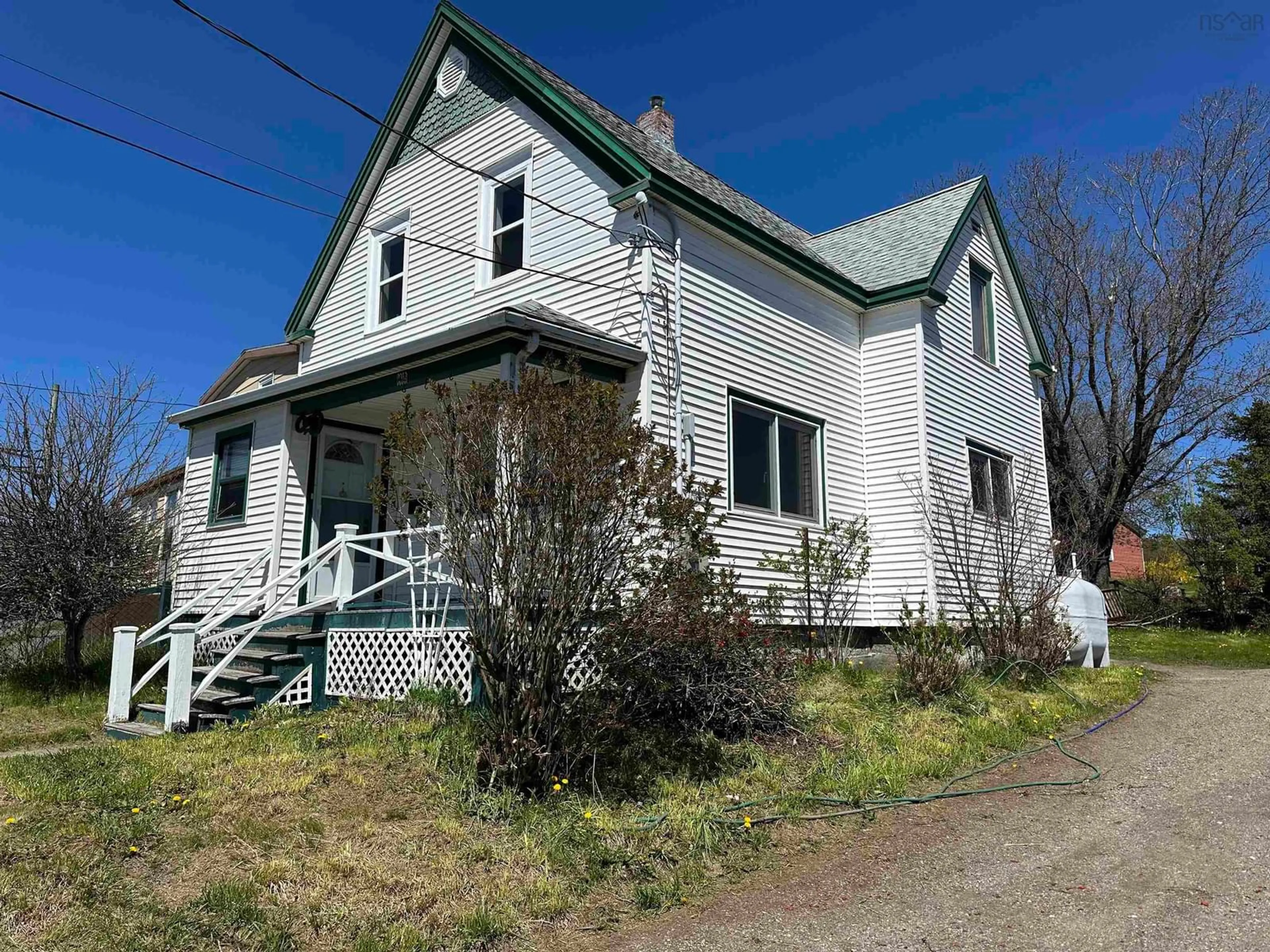 A pic from outside/outdoor area/front of a property/back of a property/a pic from drone, street for 1412 Victoria Rd, Sydney Nova Scotia B1N 1M5