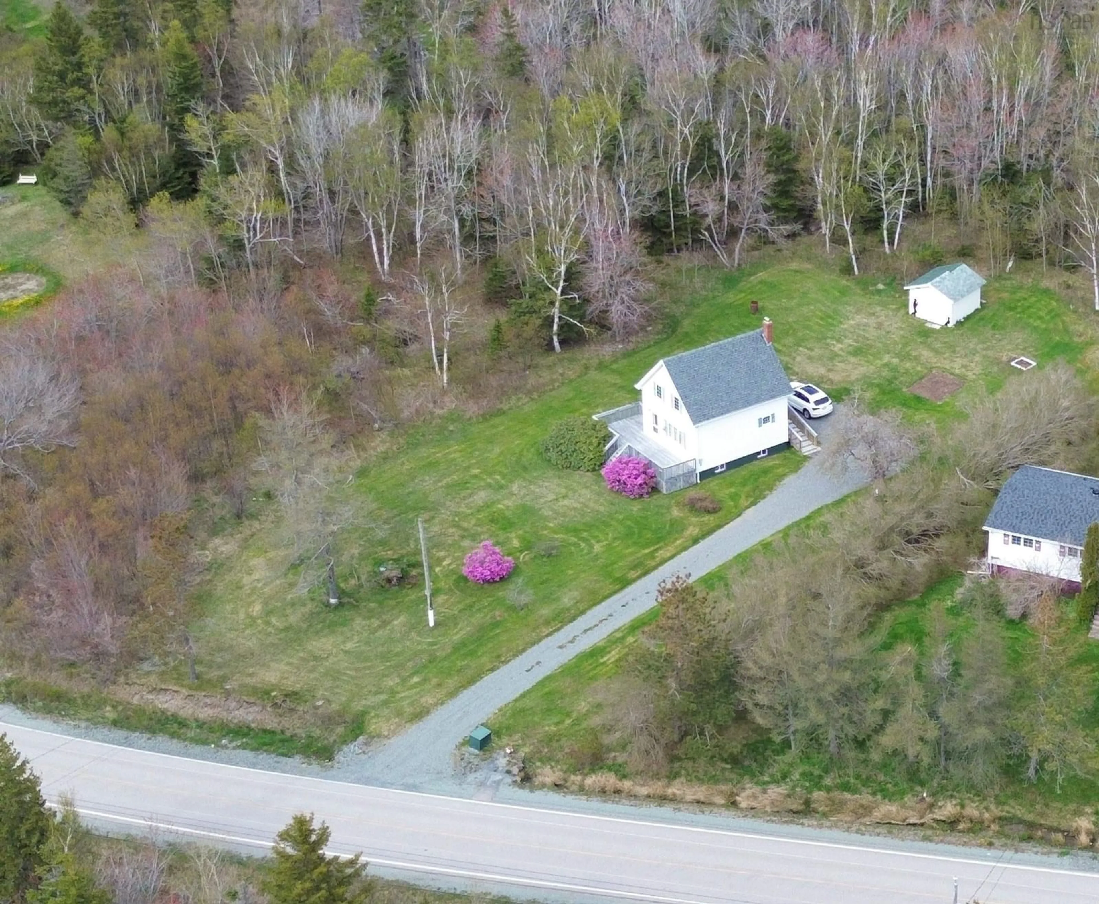 A pic from outside/outdoor area/front of a property/back of a property/a pic from drone, street for 1627 Morien Hwy, Port Caledonia Nova Scotia B1A 6V1