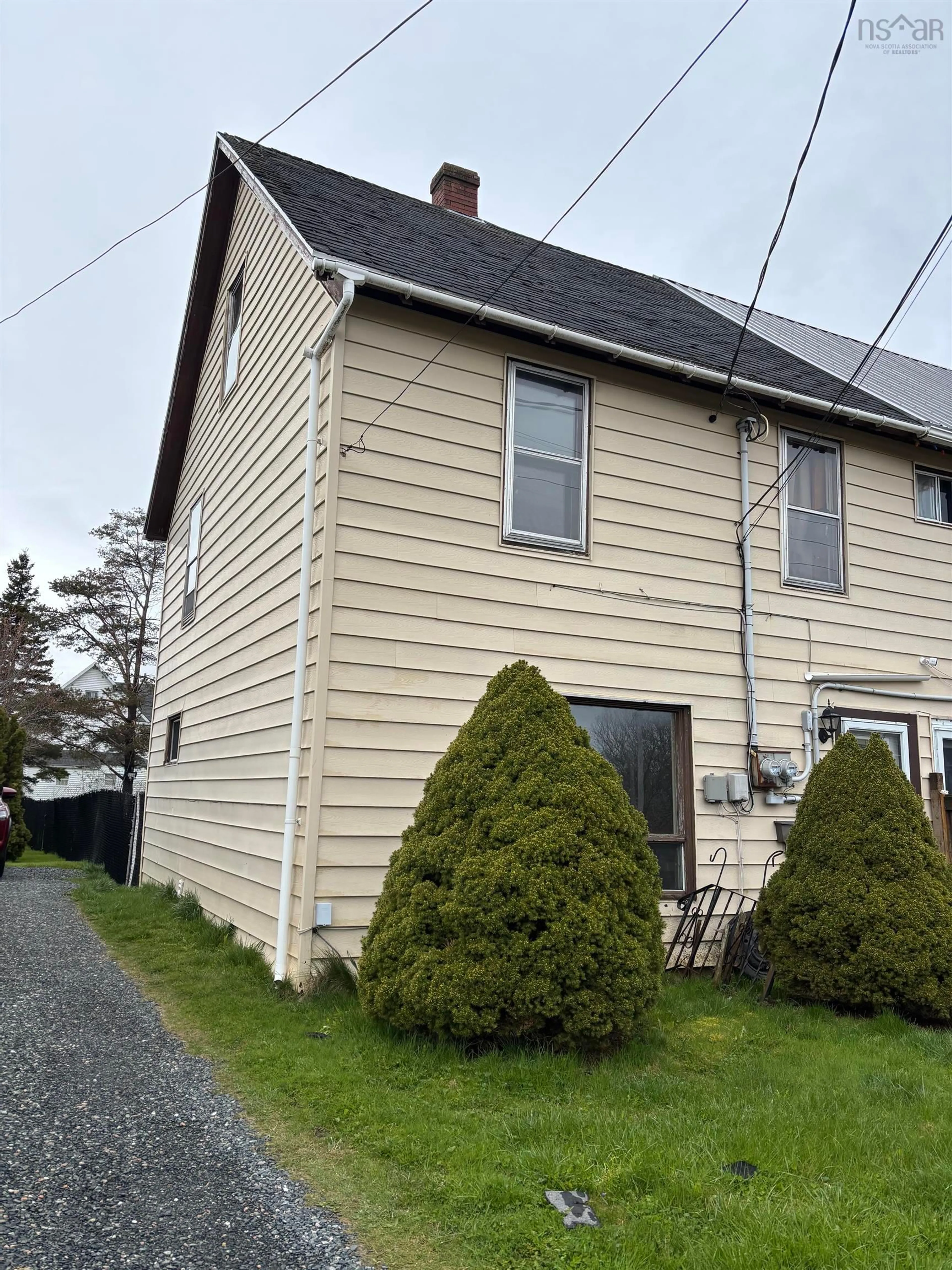 Home with vinyl exterior material, street for 14 Oxford Avenue, Sydney Mines Nova Scotia B1V 2H9