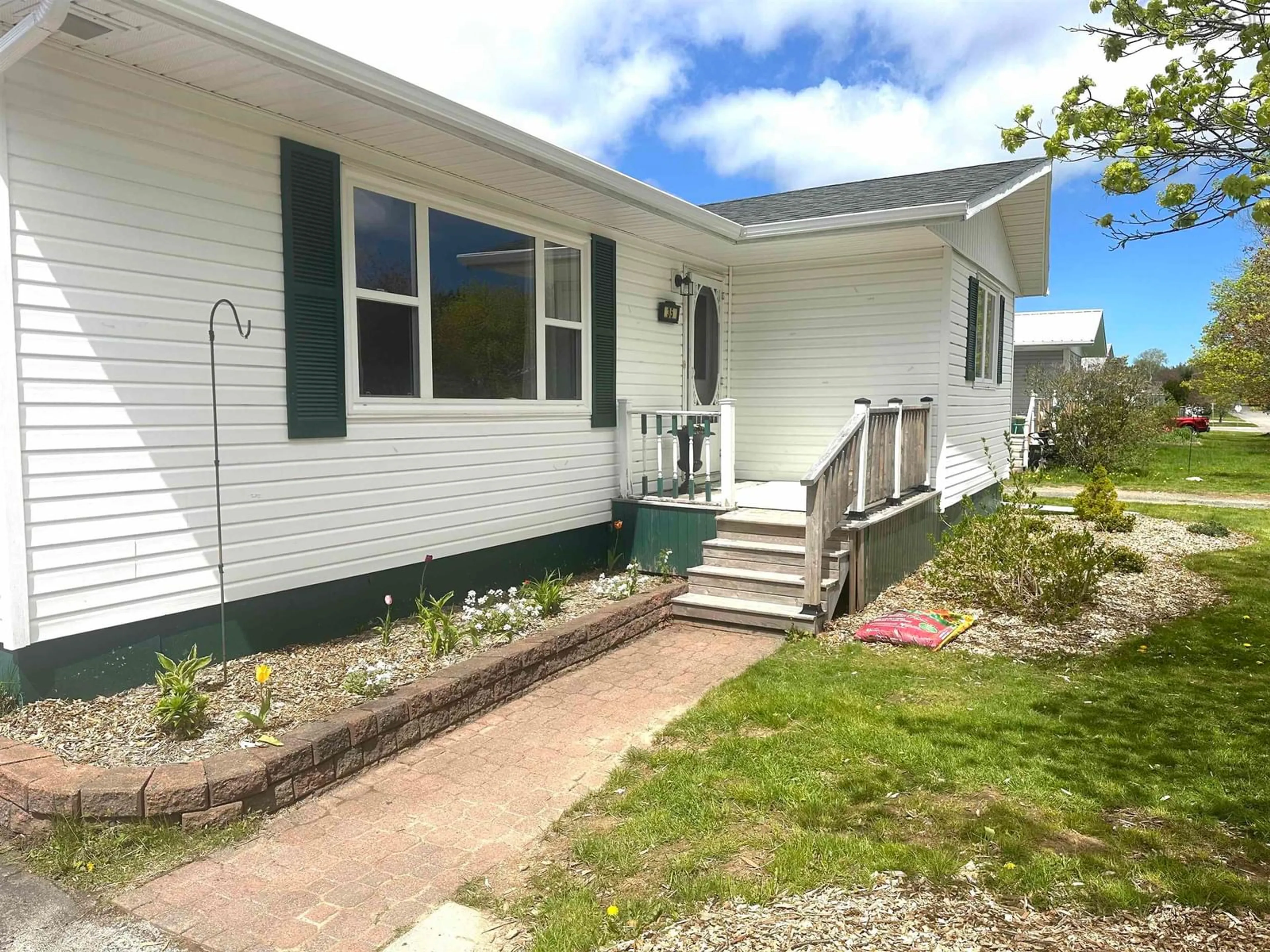 Home with vinyl exterior material, street for 35 Hemlock Dr, Port Hawkesbury Nova Scotia B9A 3G5