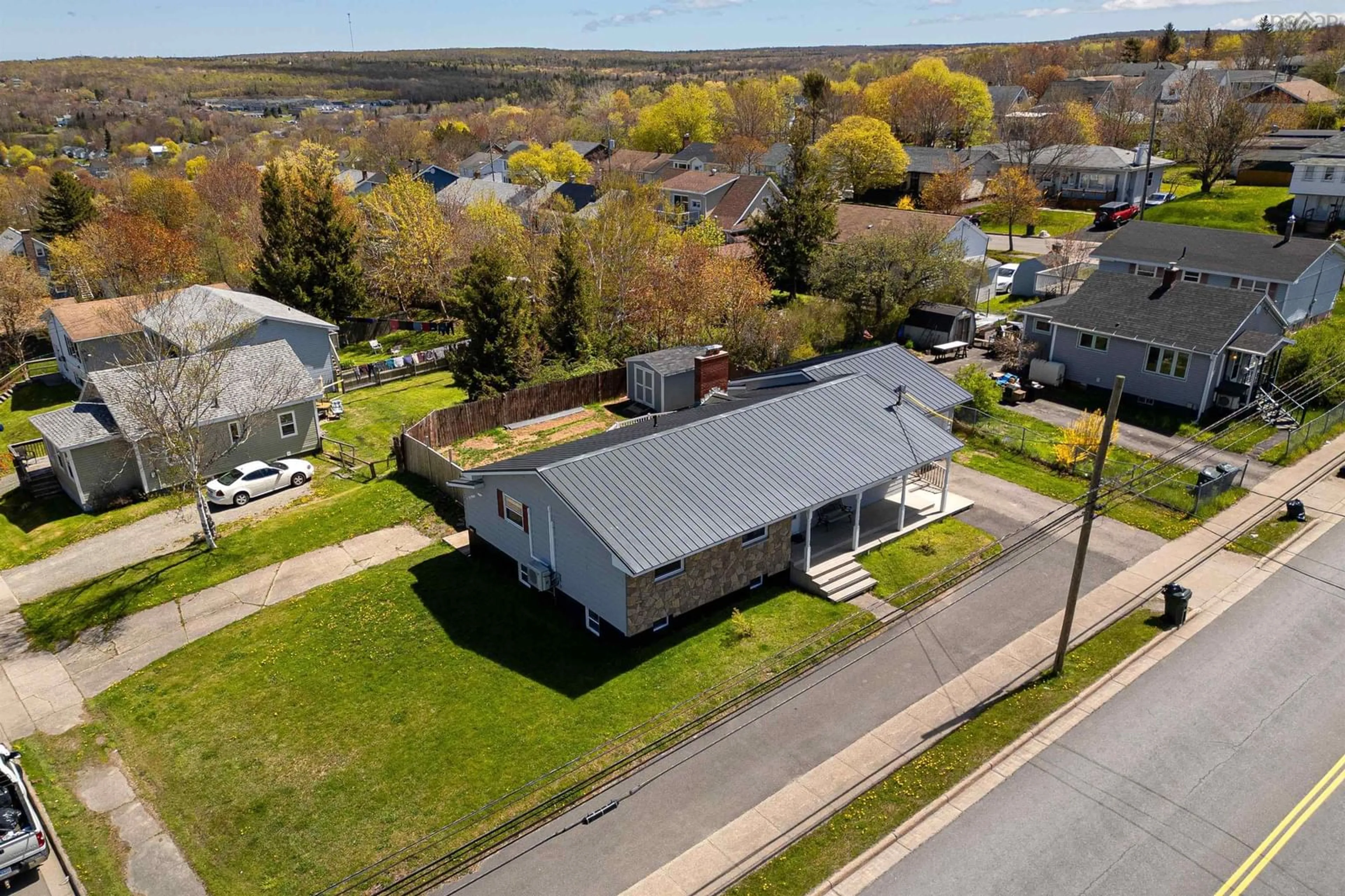 A pic from outside/outdoor area/front of a property/back of a property/a pic from drone, street for 1131 George St, Sydney Nova Scotia B1P 1N4