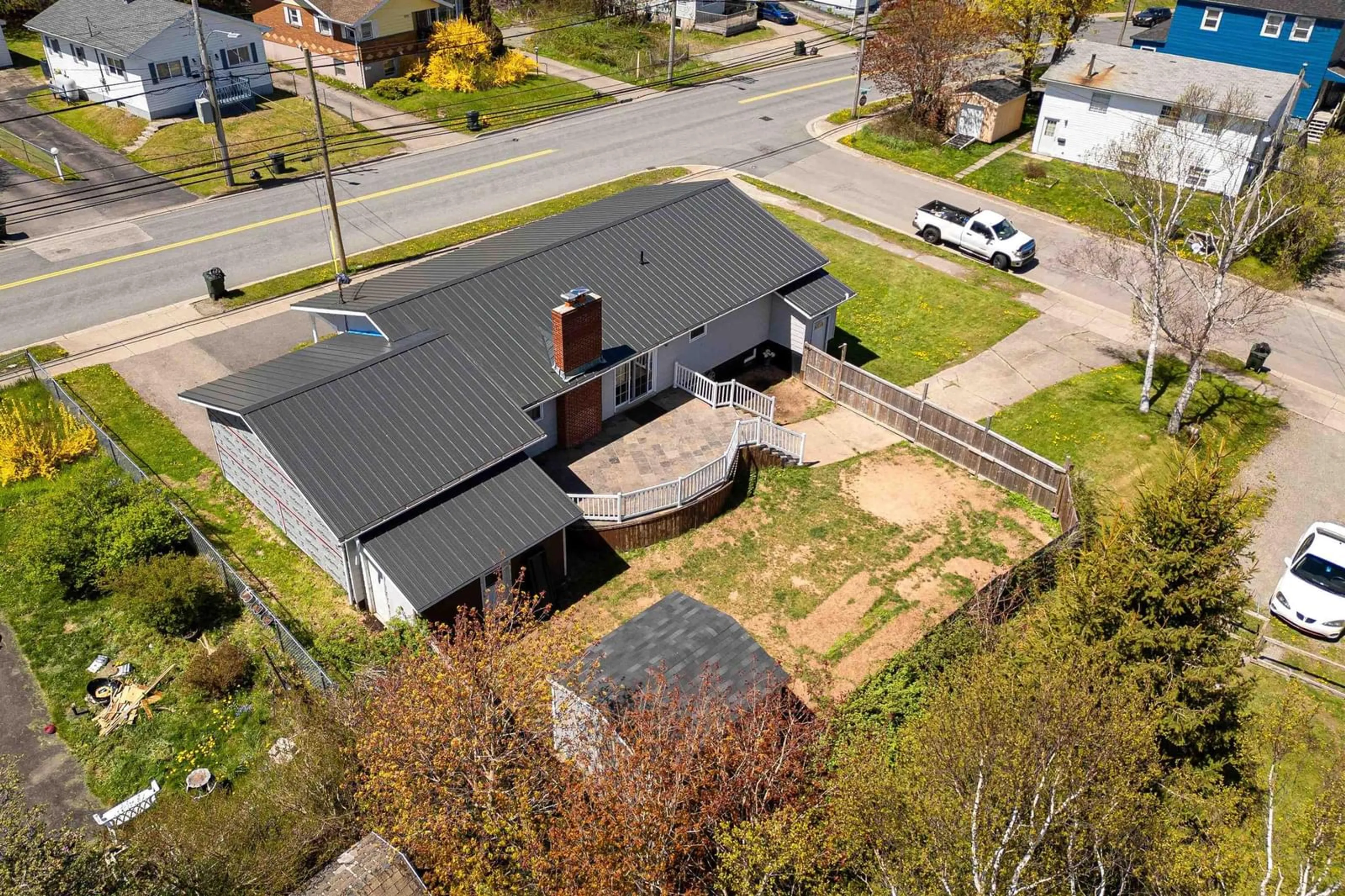 A pic from outside/outdoor area/front of a property/back of a property/a pic from drone, street for 1131 George St, Sydney Nova Scotia B1P 1N4