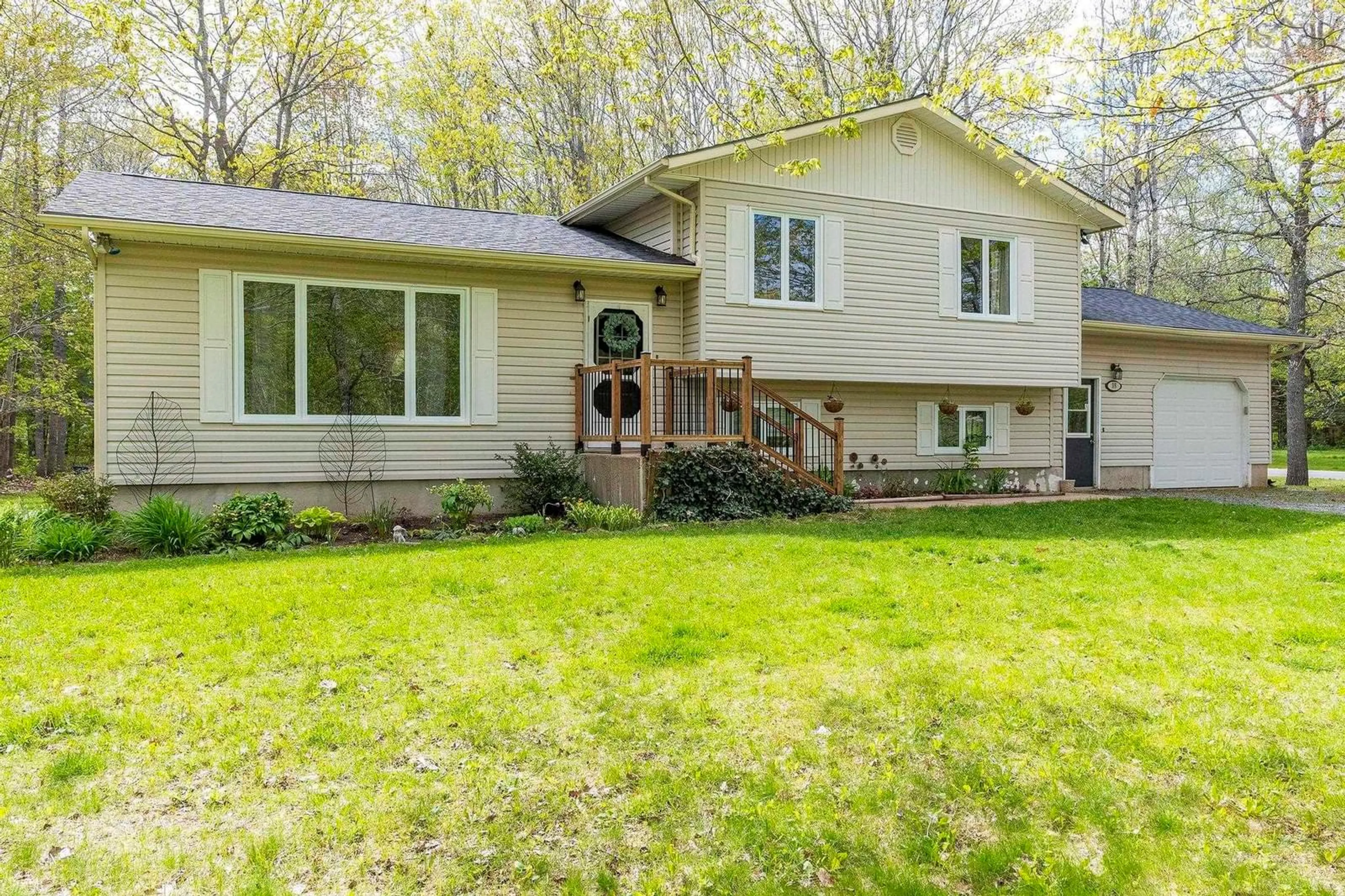 Home with vinyl exterior material, street for 35 Poplar Dr, Meadowvale Nova Scotia B0P 1R0