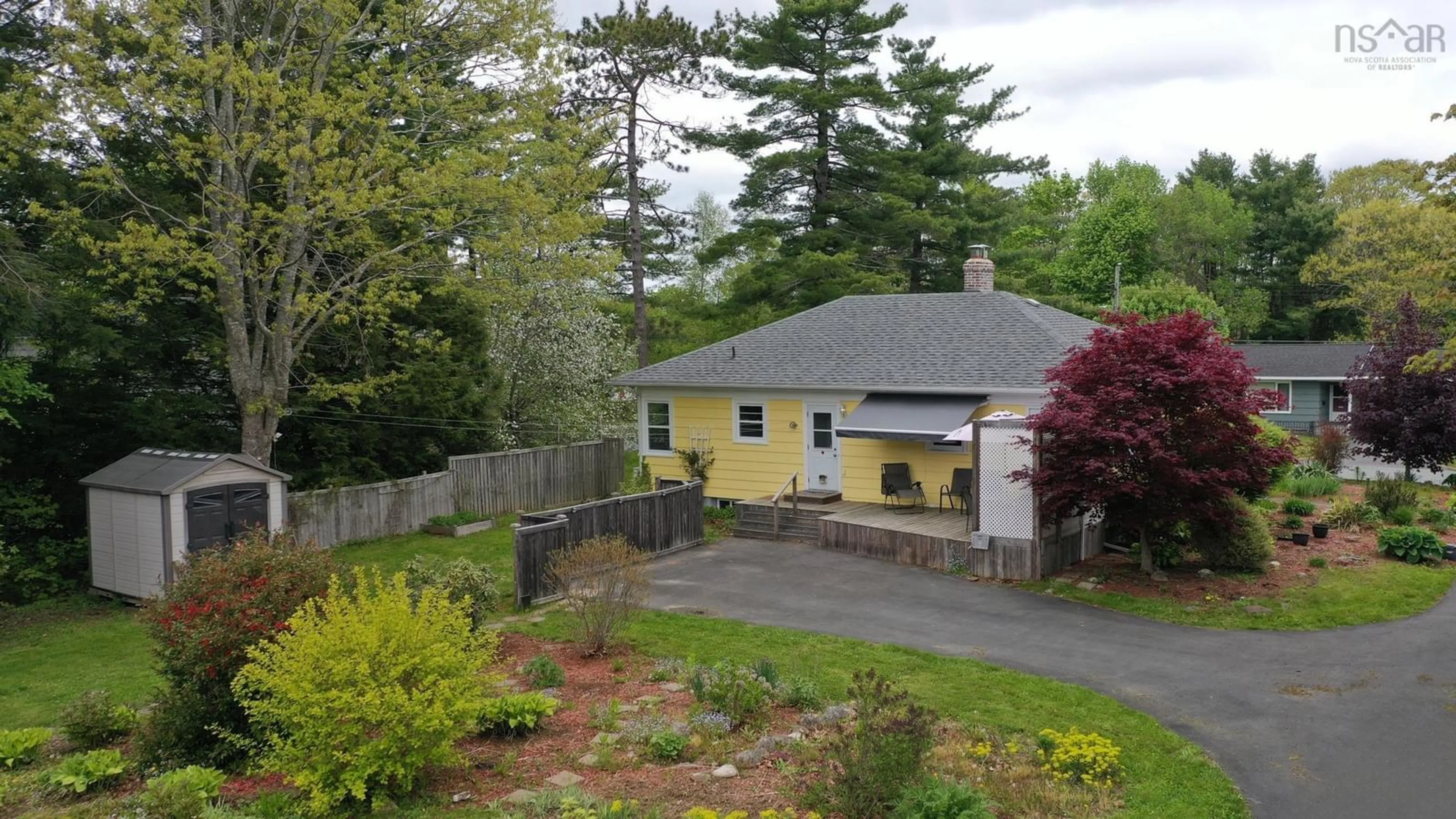 A pic from outside/outdoor area/front of a property/back of a property/a pic from drone, street for 129 Hillcrest St, Bridgewater Nova Scotia B4V 1T2