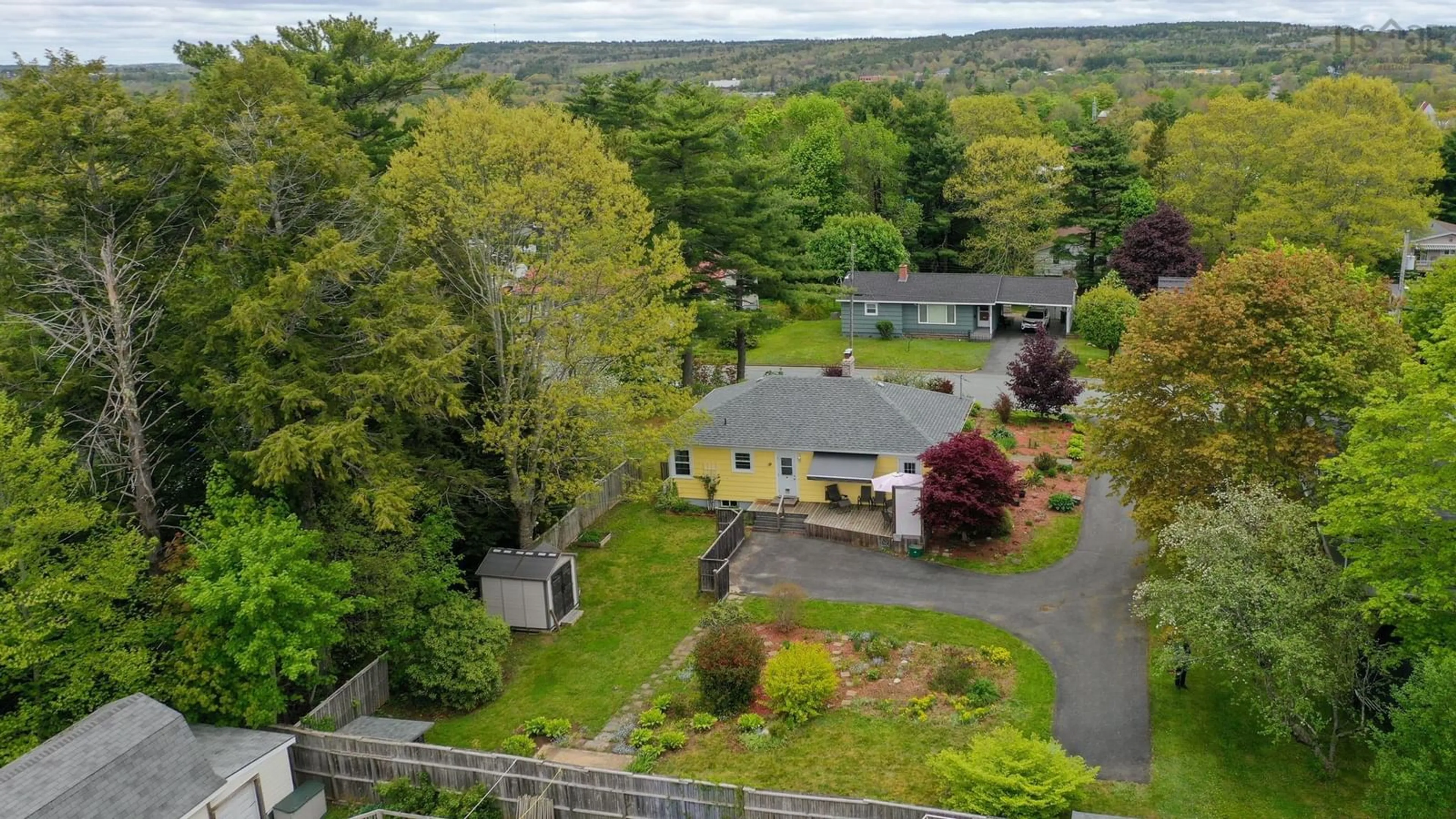 A pic from outside/outdoor area/front of a property/back of a property/a pic from drone, unknown for 129 Hillcrest St, Bridgewater Nova Scotia B4V 1T2