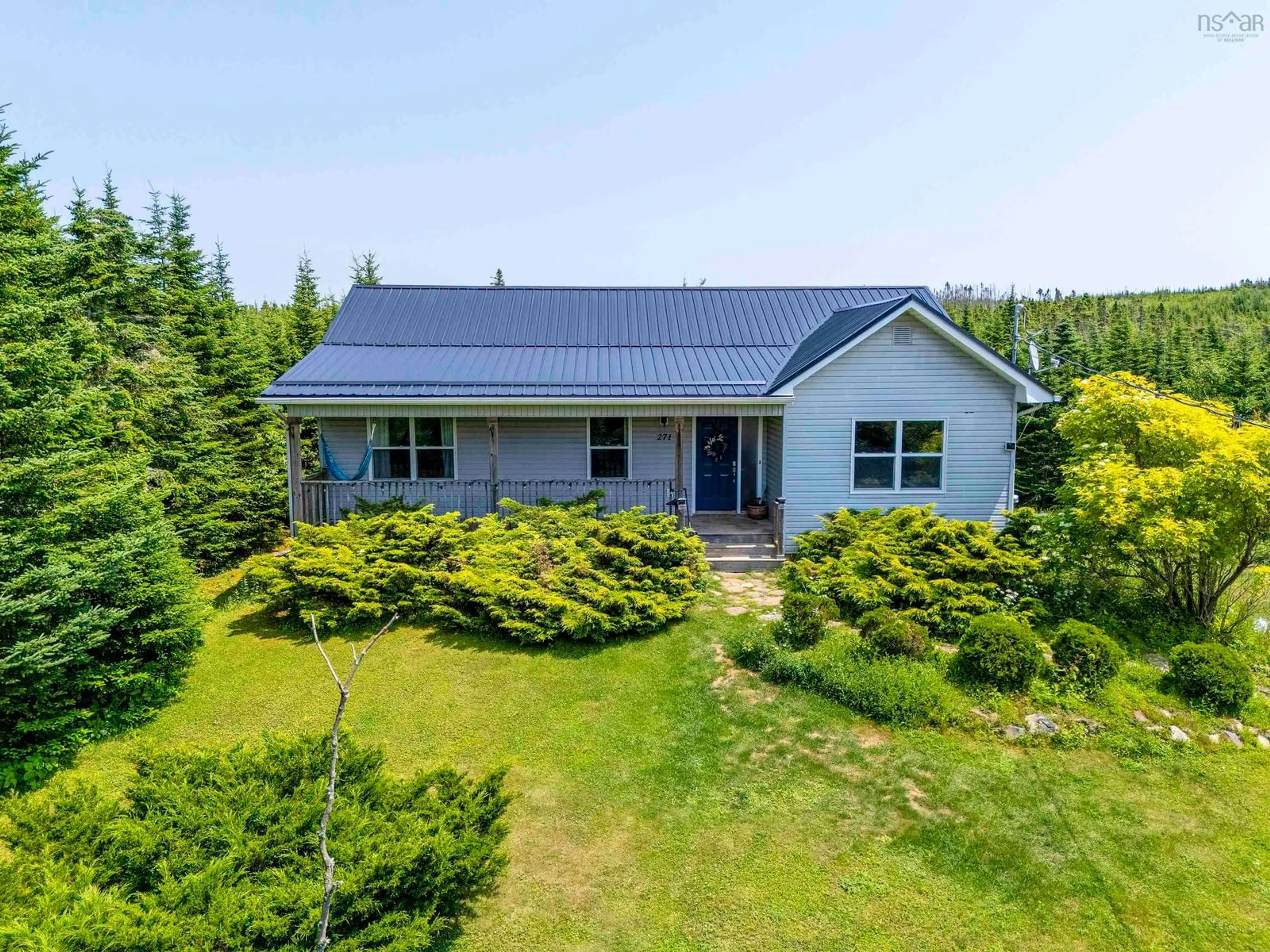 A pic from outside/outdoor area/front of a property/back of a property/a pic from drone, building for 271 Leslie Rd, East Lawrencetown Nova Scotia B2Z 1T4