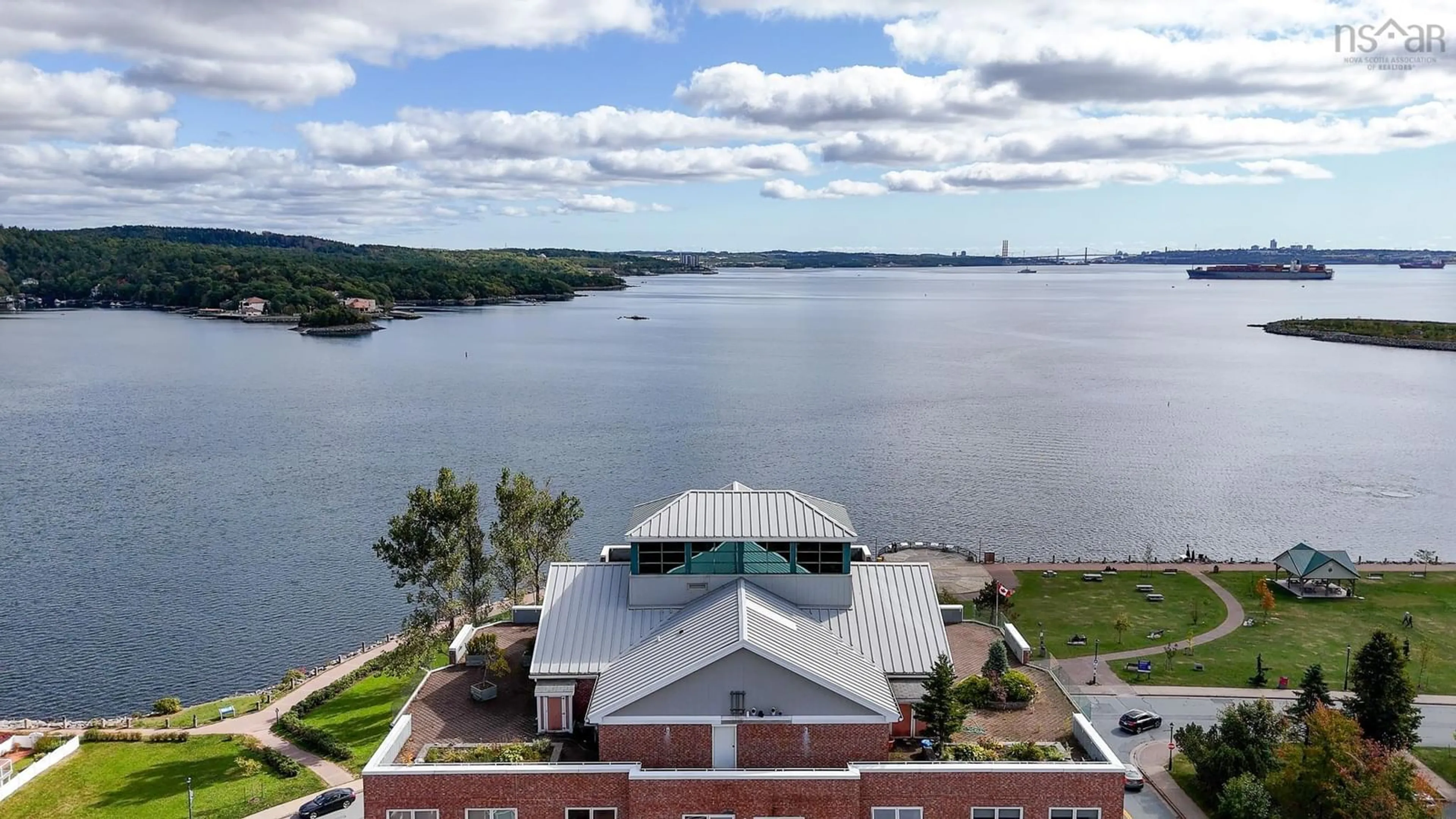 A pic from outside/outdoor area/front of a property/back of a property/a pic from drone, water/lake/river/ocean view for 99 Waterfront Dr #303, Bedford Nova Scotia B4A 4K5