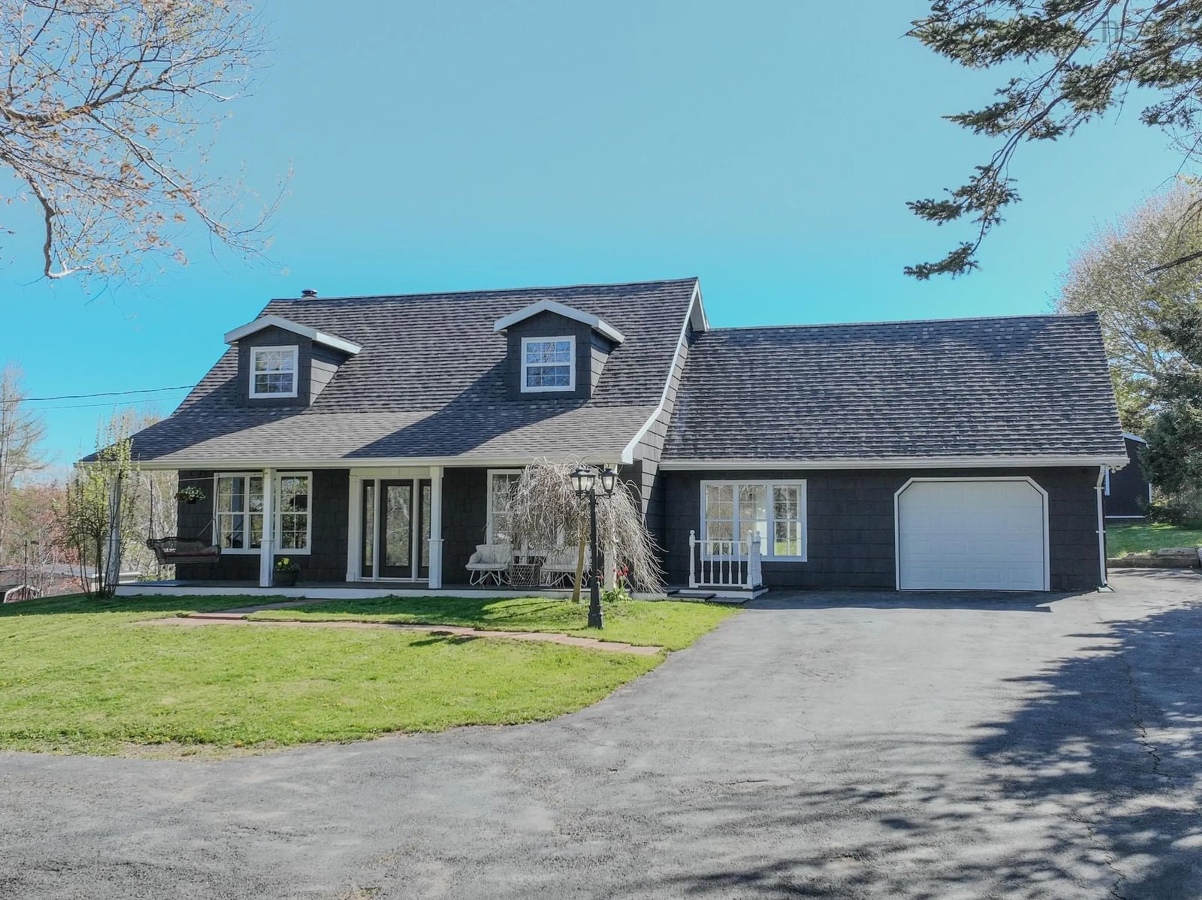 Home with vinyl exterior material, street for 311 Johnson Rd, Georges River Nova Scotia B1Y 3C1