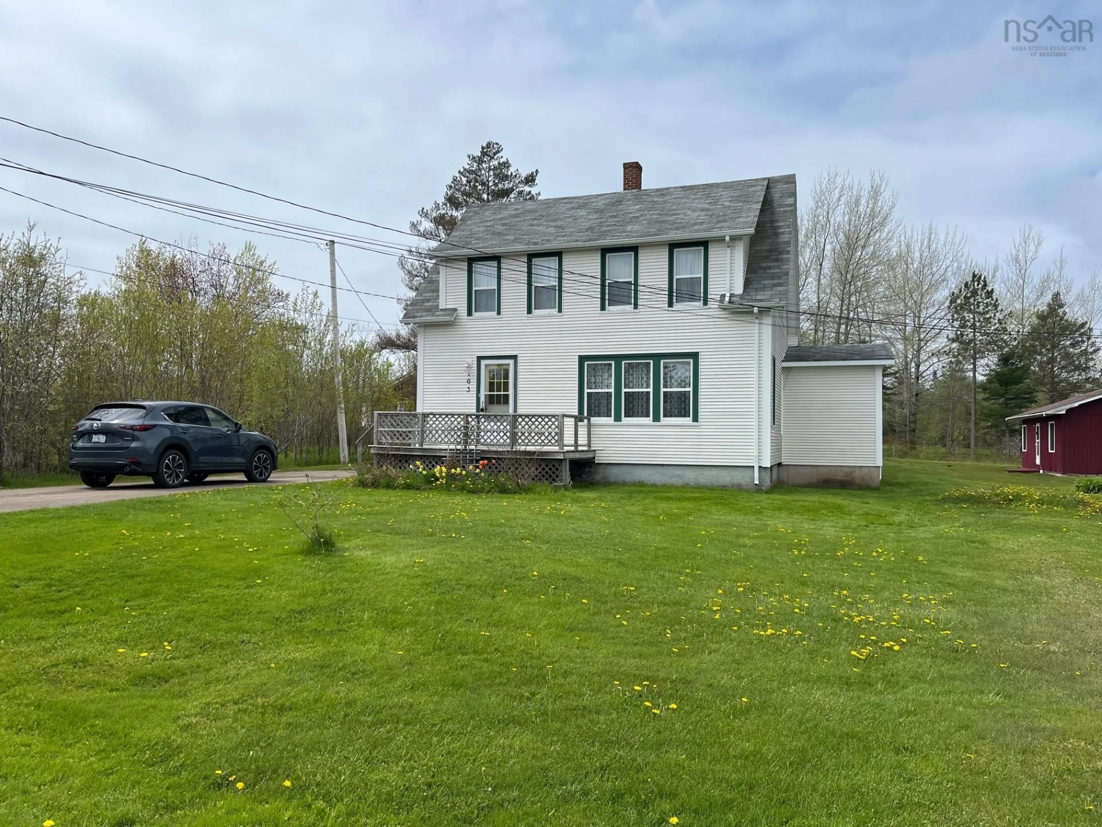 A pic from outside/outdoor area/front of a property/back of a property/a pic from drone, building for 163 Twining St, Baddeck Nova Scotia B0E 1B0