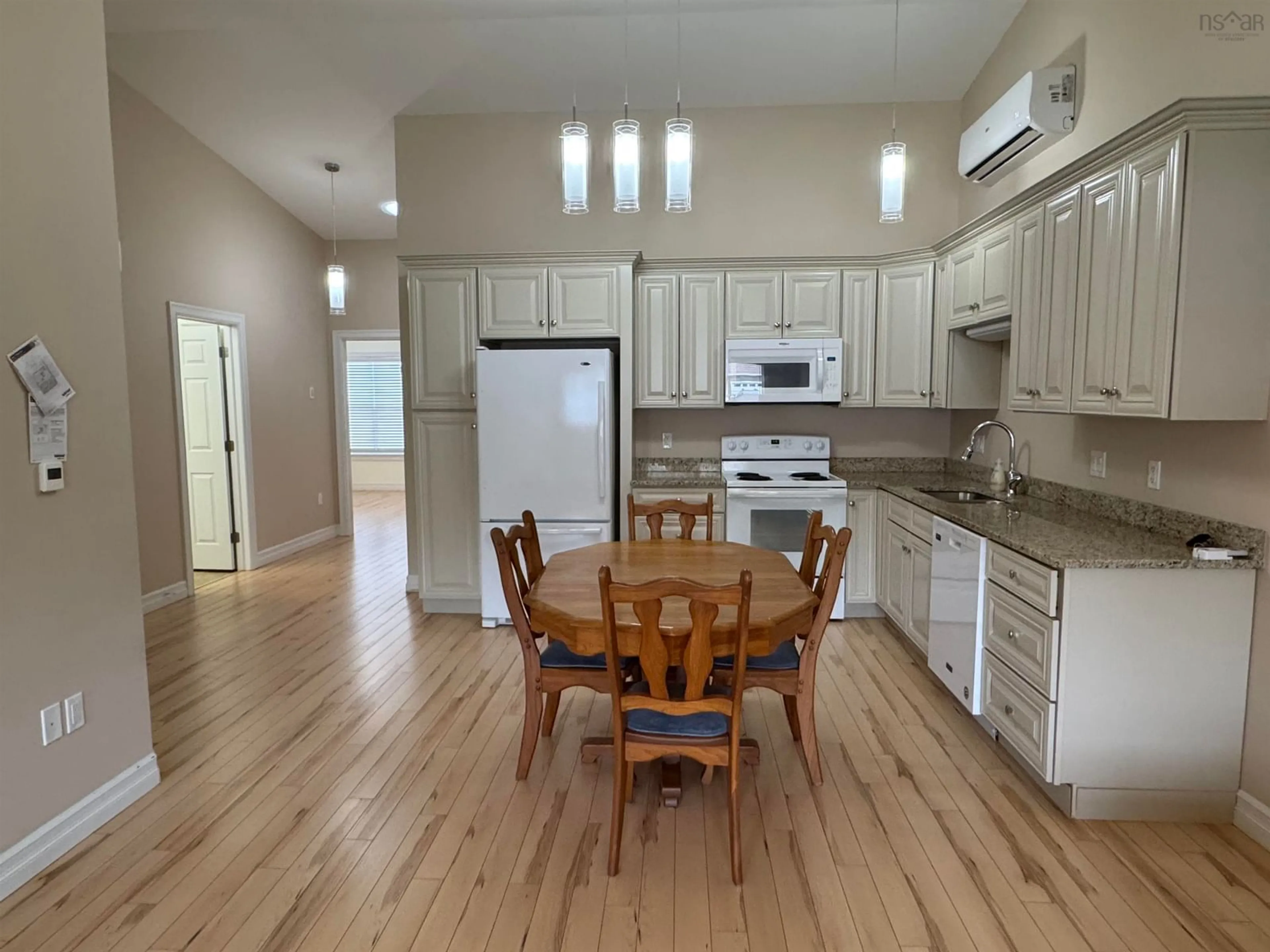 Open concept kitchen, wood/laminate floor for 6 Covington Pl, Bible Hill Nova Scotia B2N 0J8