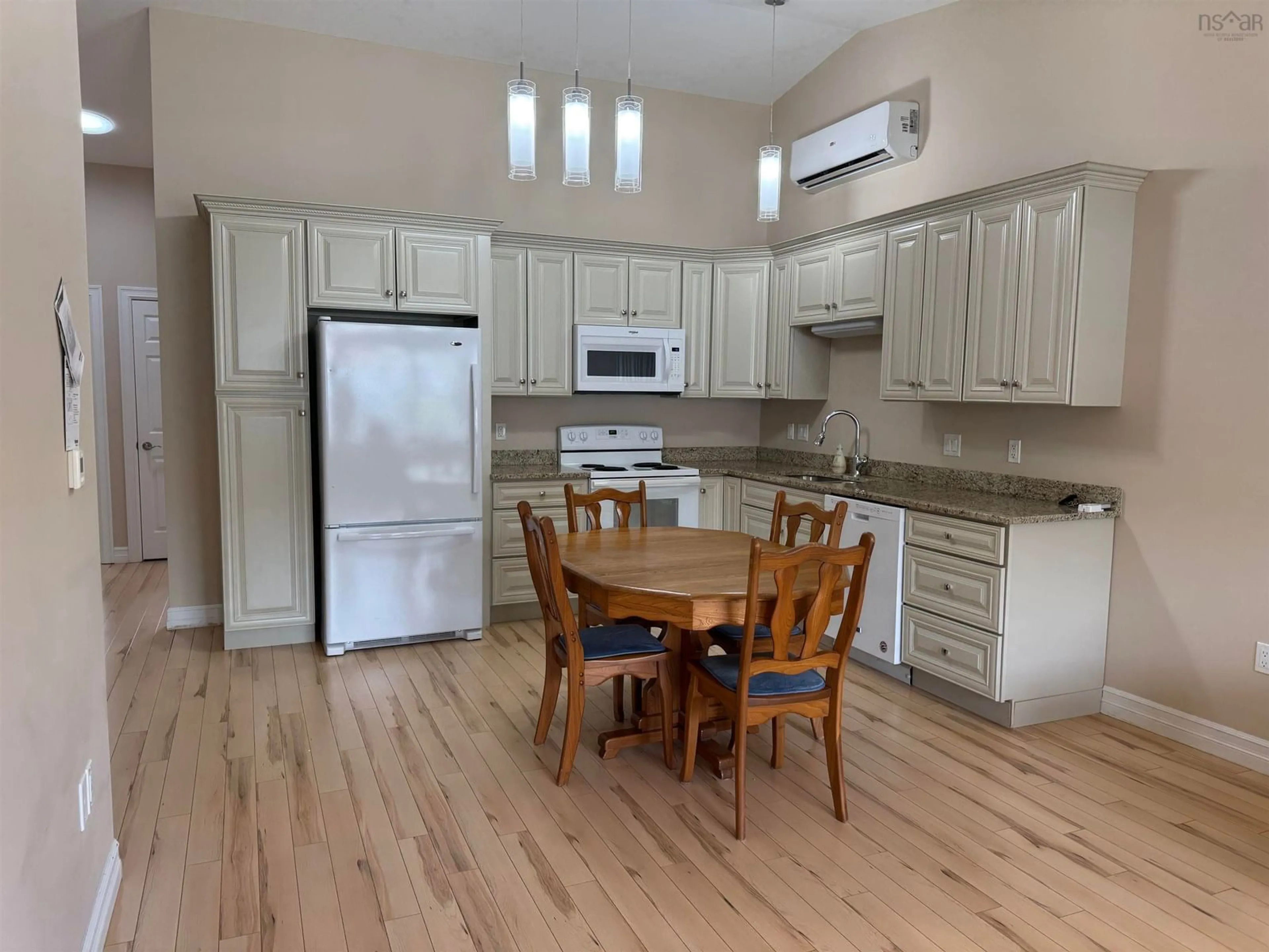 Open concept kitchen, wood/laminate floor for 6 Covington Pl, Bible Hill Nova Scotia B2N 0J8