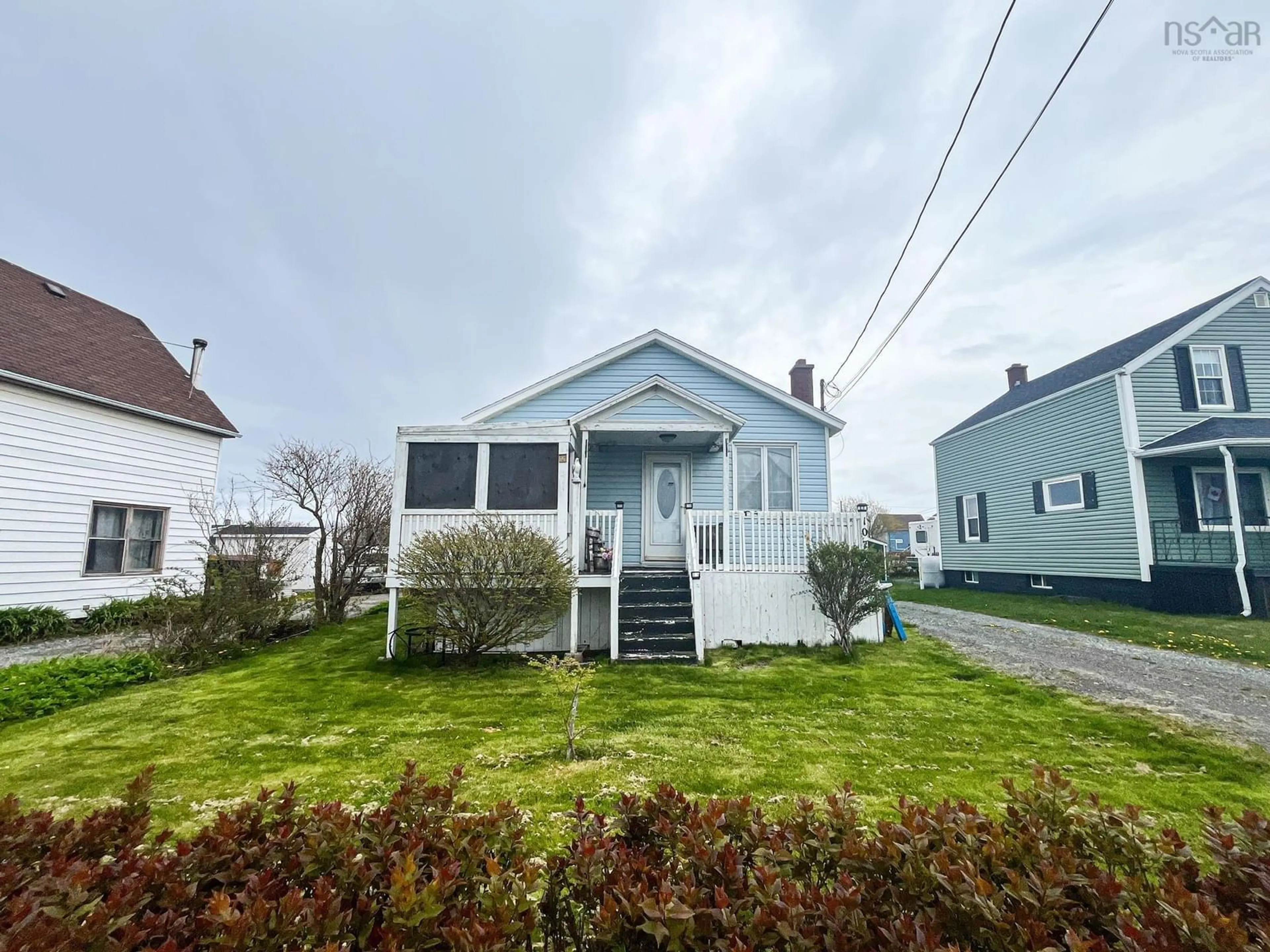 A pic from outside/outdoor area/front of a property/back of a property/a pic from drone, street for 107 Ocean Ave, Glace Bay Nova Scotia B1A 3V5