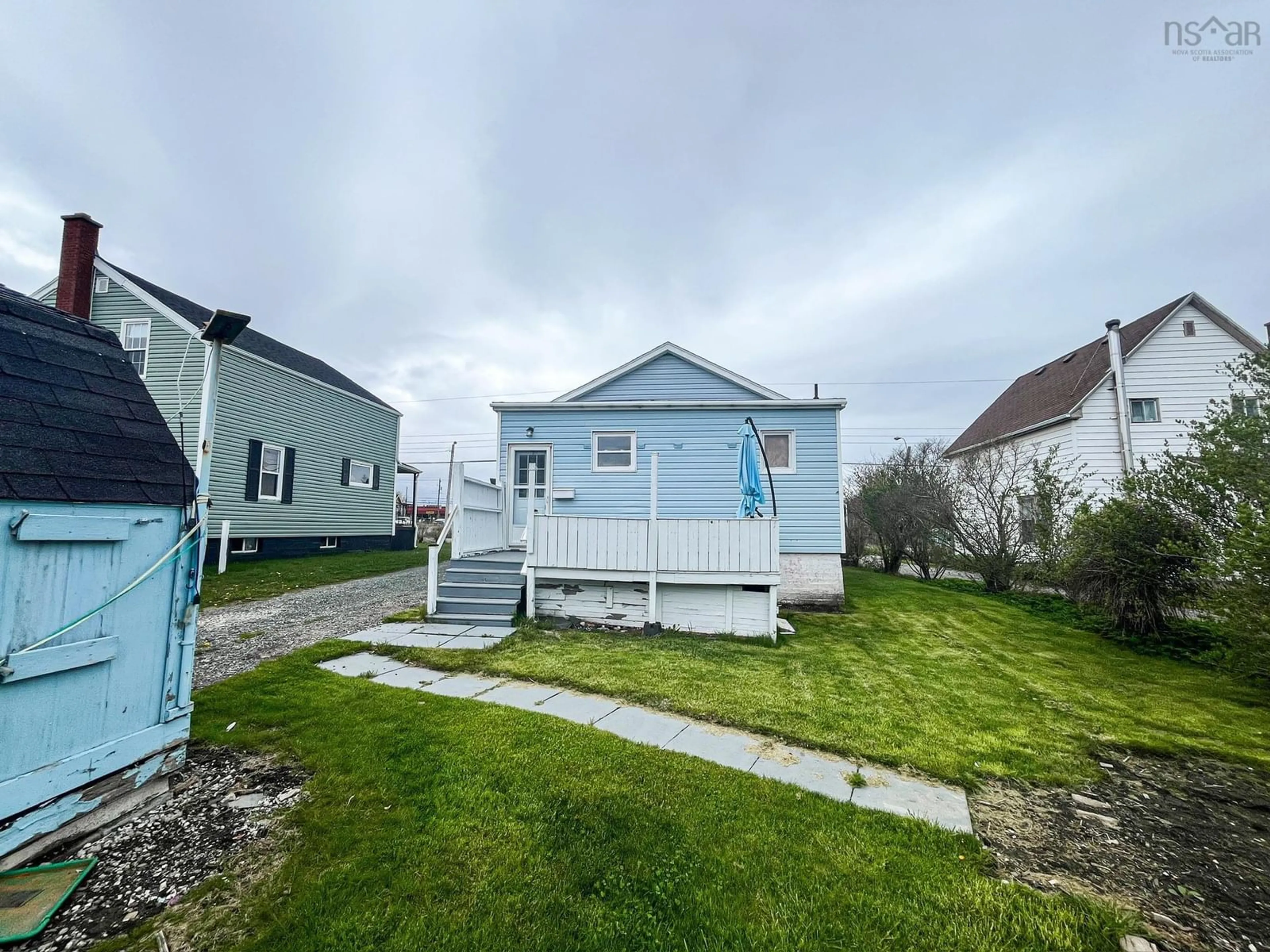 A pic from outside/outdoor area/front of a property/back of a property/a pic from drone, street for 107 Ocean Ave, Glace Bay Nova Scotia B1A 3V5