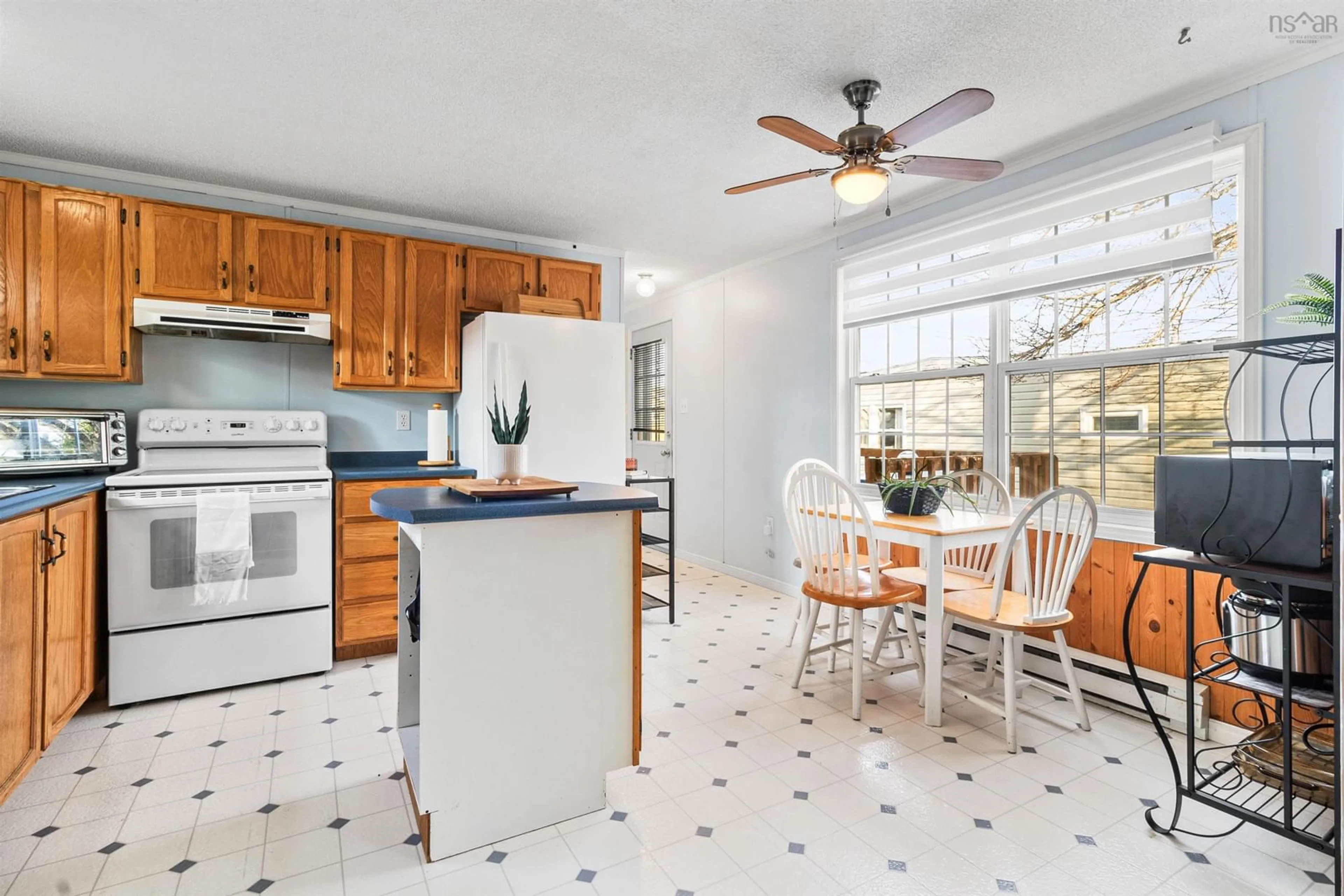 Open concept kitchen, ceramic/tile floor for 10 Apple St, Dartmouth Nova Scotia B2W 4W2