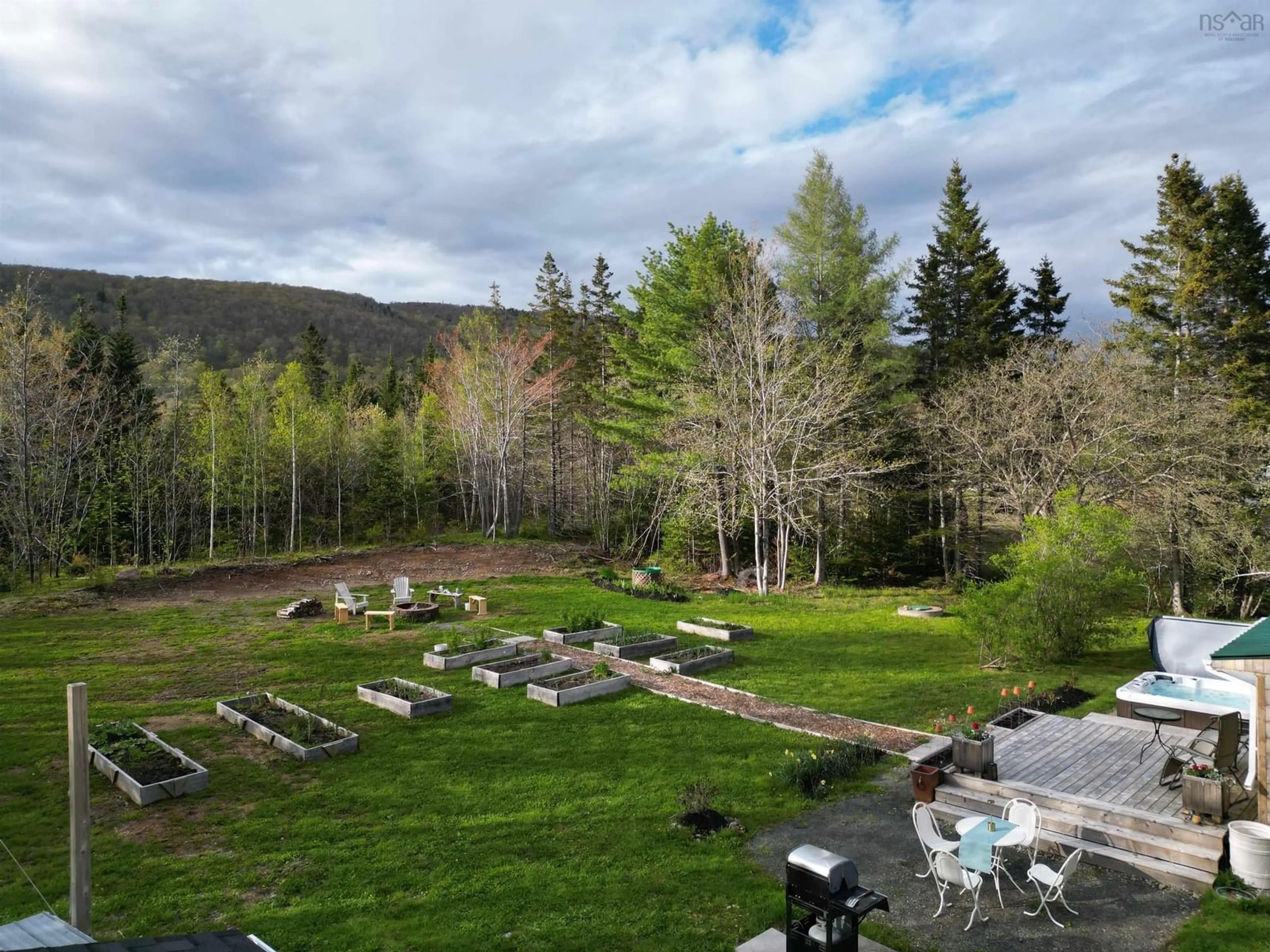 A pic from outside/outdoor area/front of a property/back of a property/a pic from drone, forest/trees view for 7873 Highway 105, Blues Mills Nova Scotia B0E 2Y0