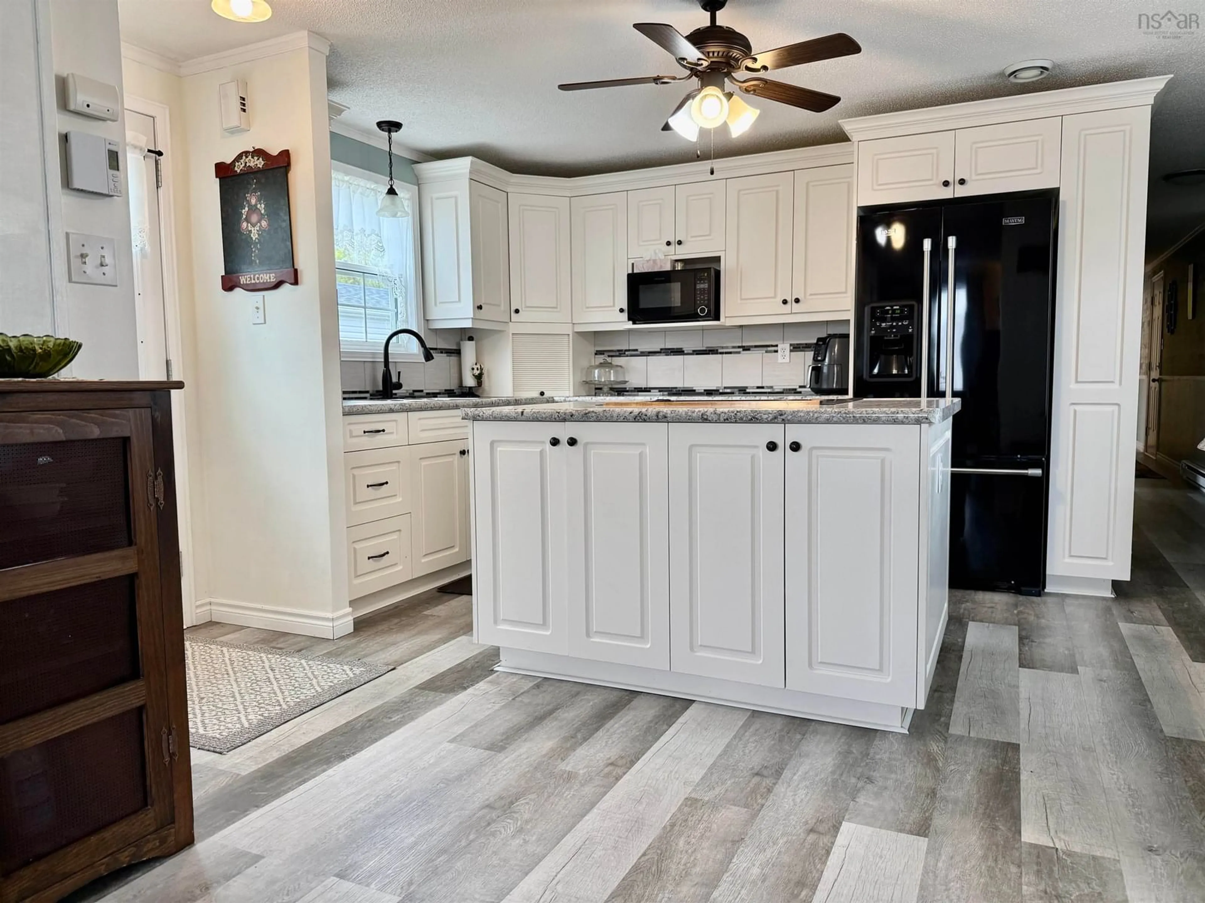 Open concept kitchen, ceramic/tile floor for 33 Clairmount Ave, Bridgewater Nova Scotia B4V 4C7