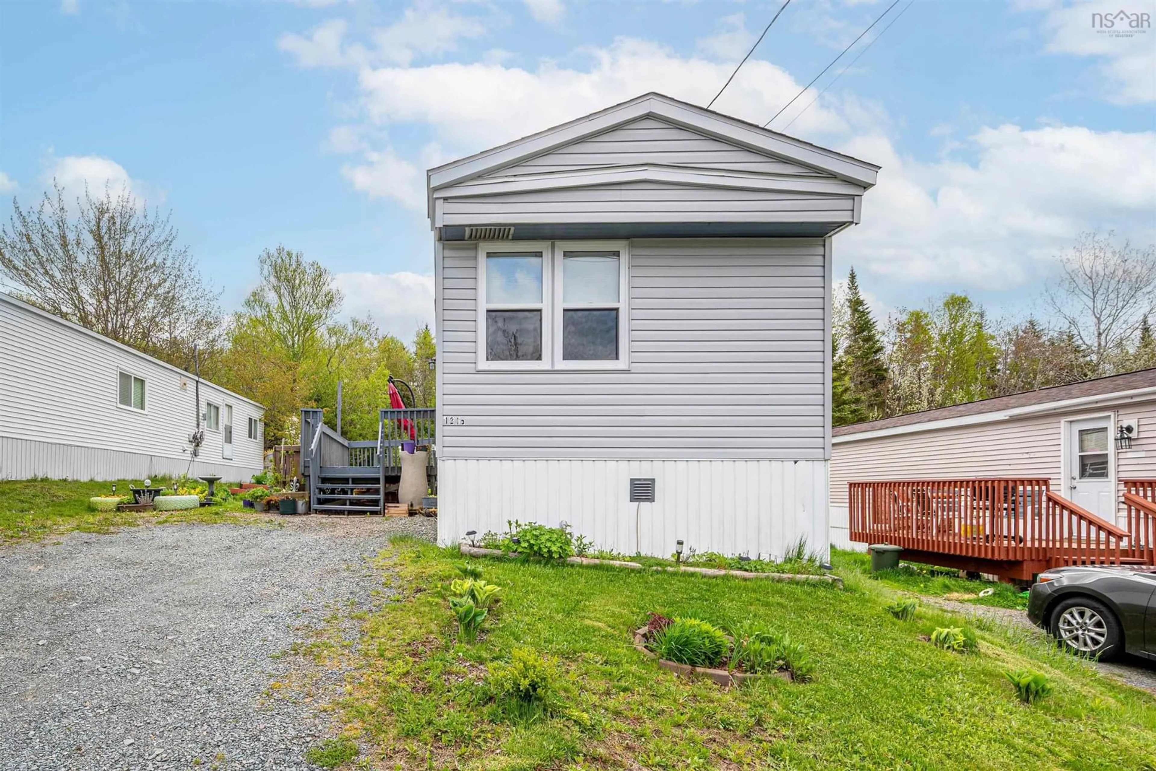 Home with vinyl exterior material, street for 1216 Susan Dr, Beaver Bank Nova Scotia B4G 1B6