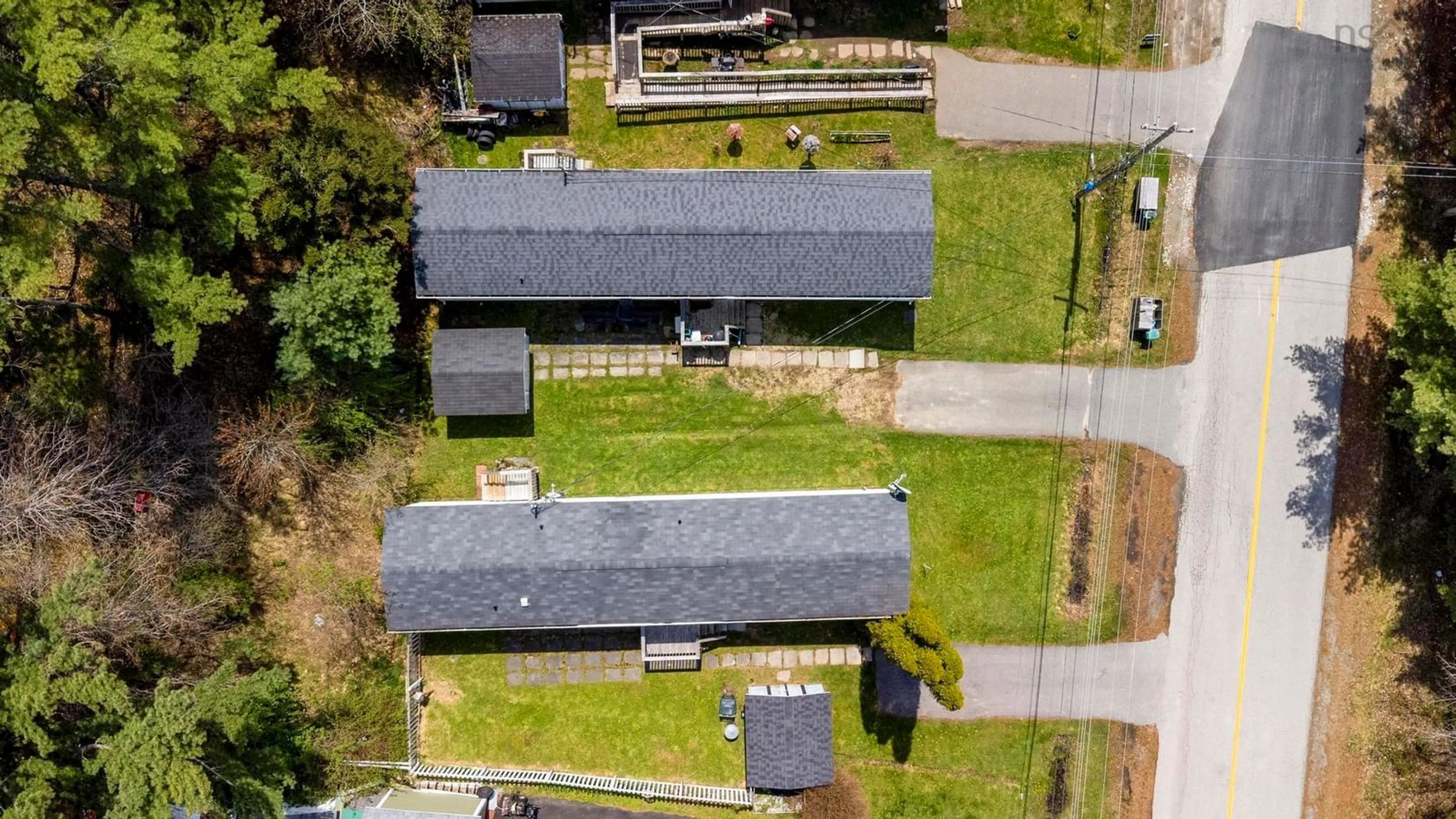 A pic from outside/outdoor area/front of a property/back of a property/a pic from drone, building for 104 Commission St, Sandy Point Nova Scotia B0T 1W0