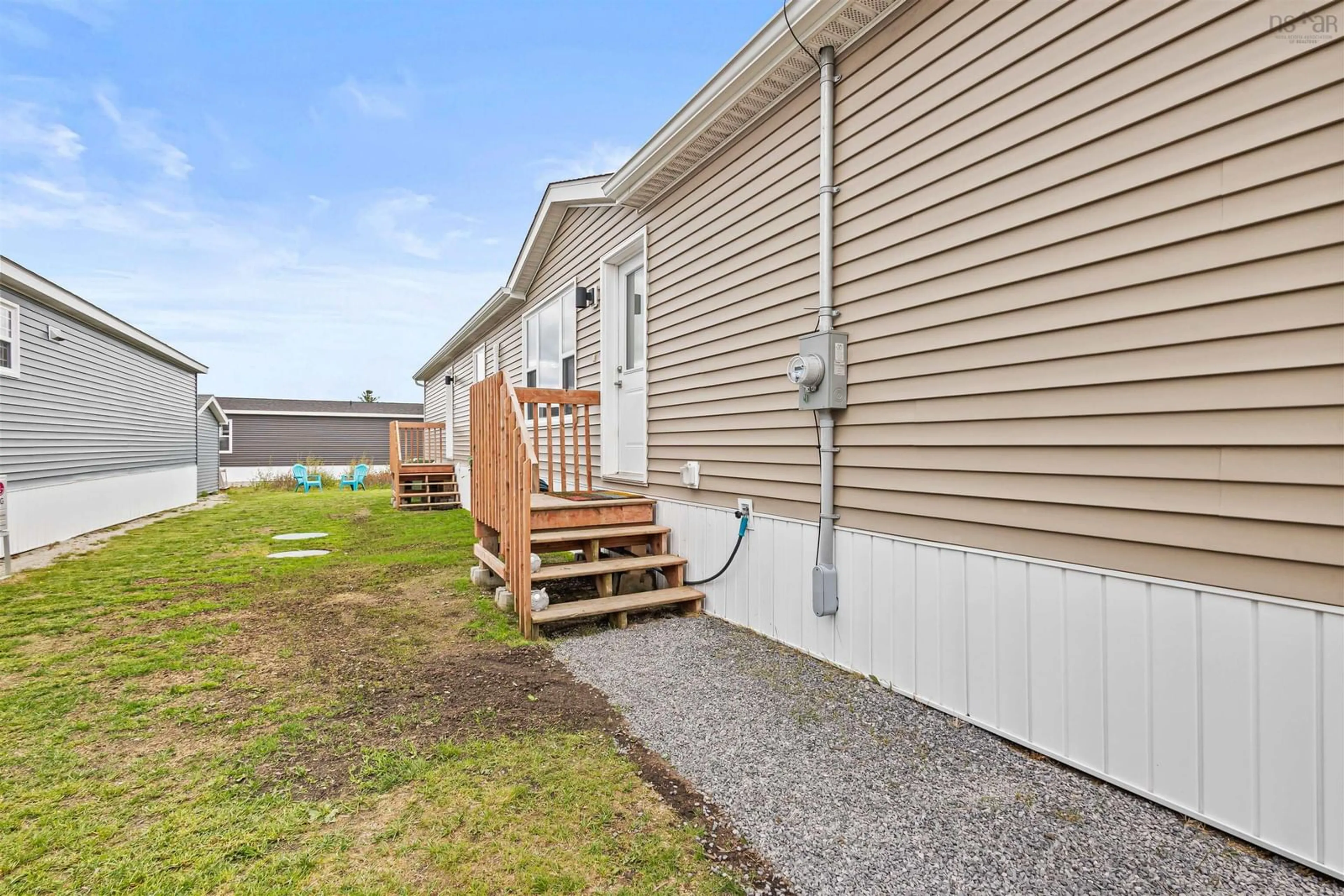 Home with vinyl exterior material, street for 26 Breeze Cir, Simms Settlement Nova Scotia B0J 1T0