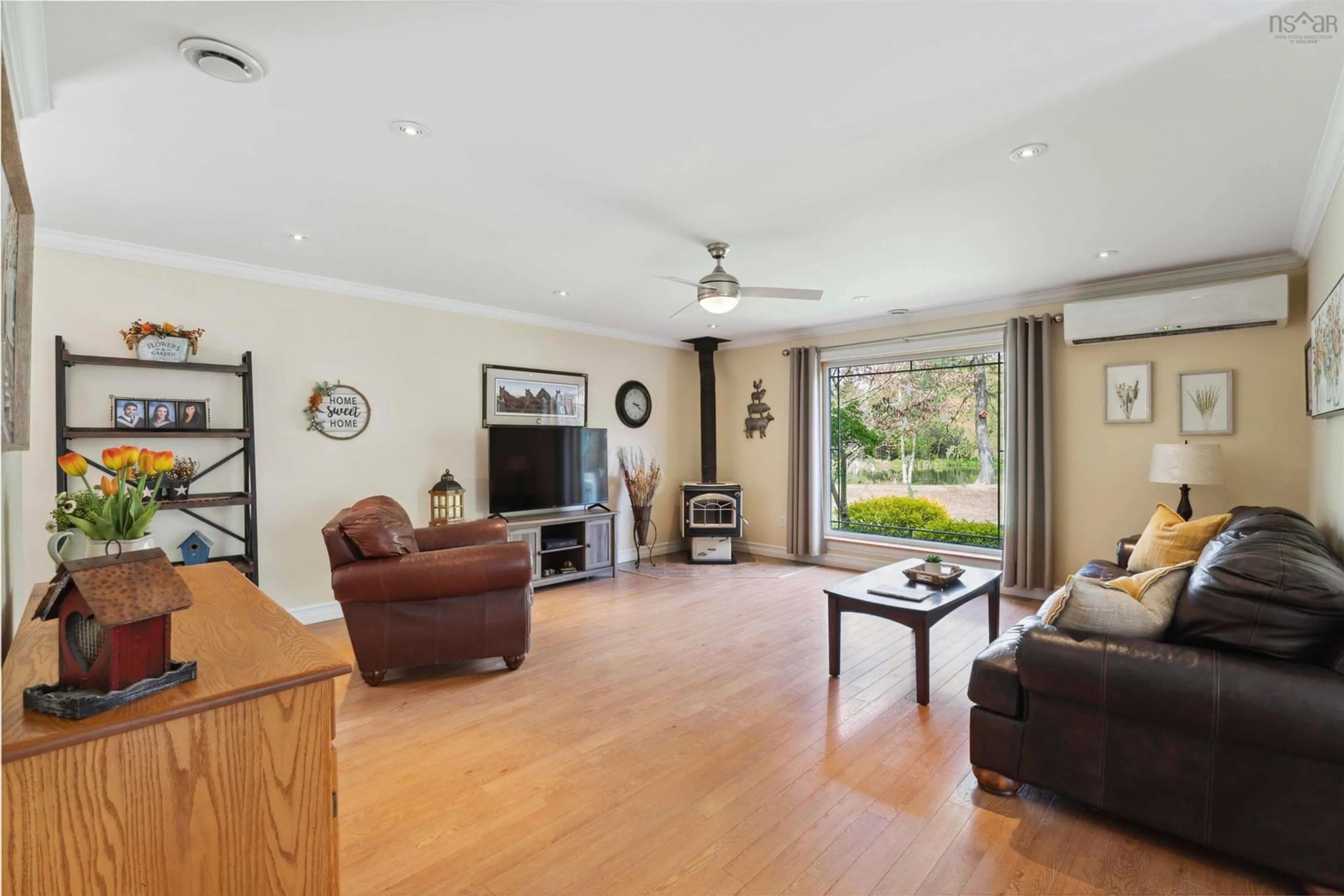 Living room with furniture, wood/laminate floor for 3697 Black Rock Rd, Whites Corner Nova Scotia B0P 1V0