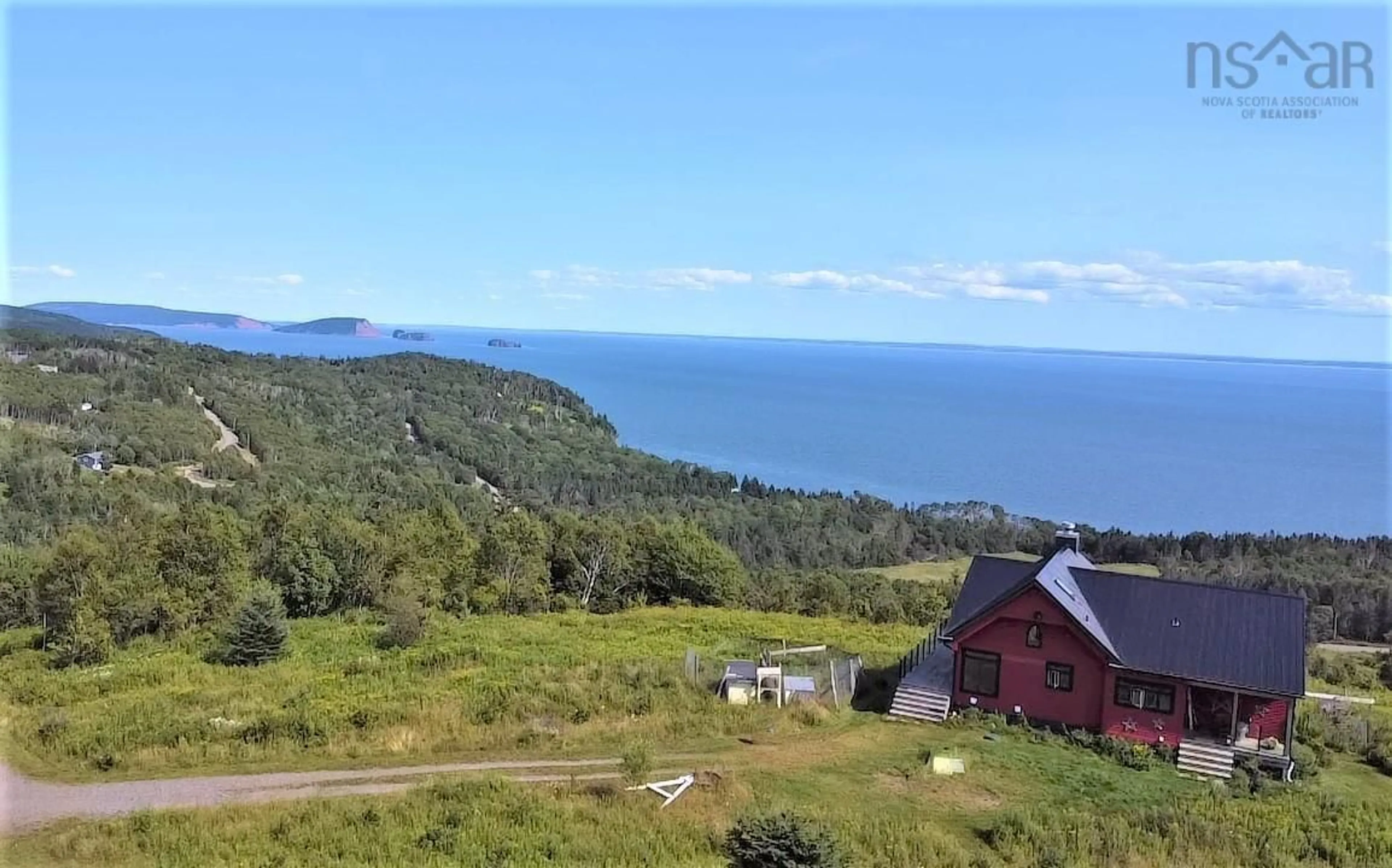 A pic from outside/outdoor area/front of a property/back of a property/a pic from drone, water/lake/river/ocean view for 2403 Two Island Rd, Two Islands Nova Scotia B0M 1S0