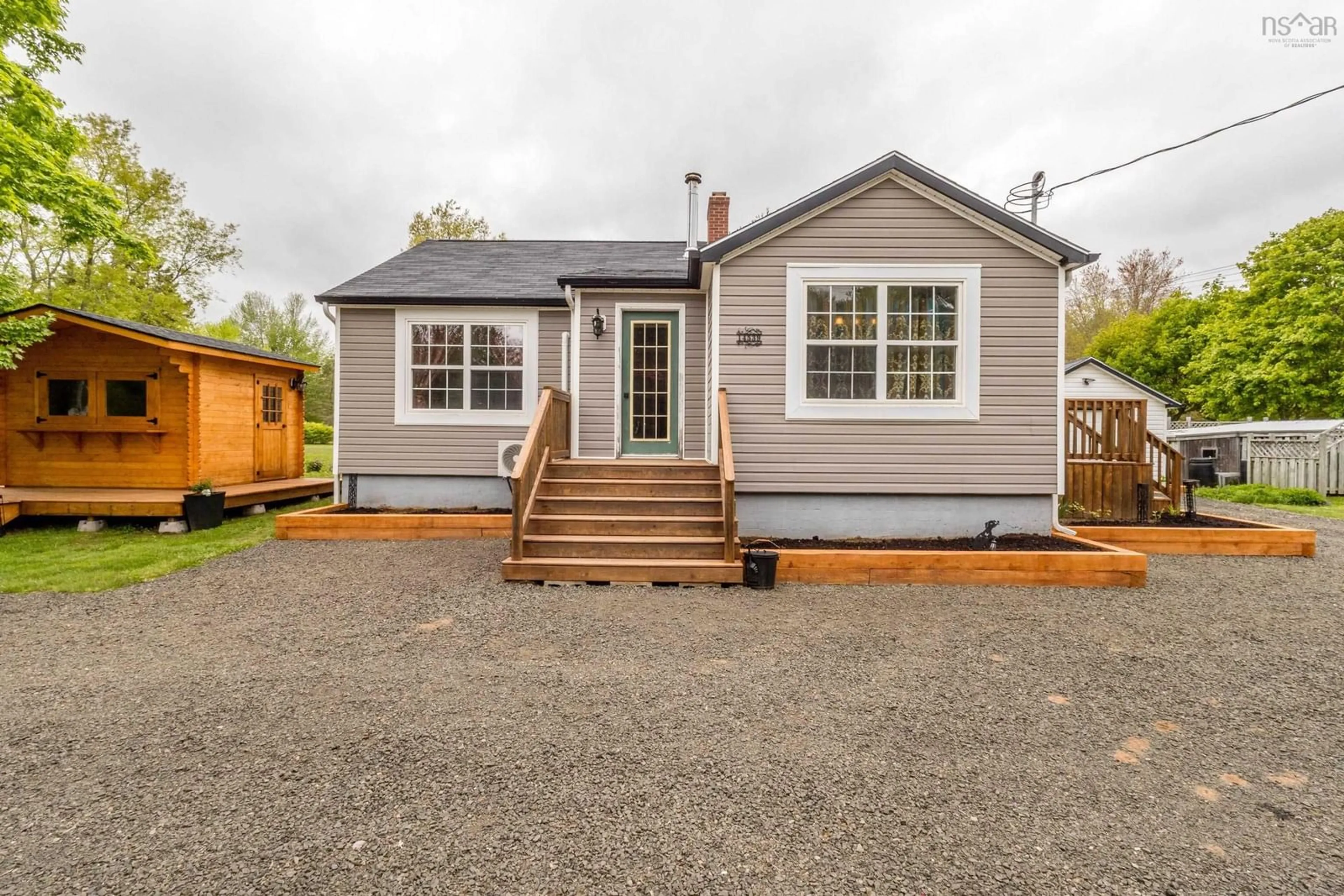 Home with vinyl exterior material, street for 14537-14539 Highway 1, Wilmot Nova Scotia B0P 1W0