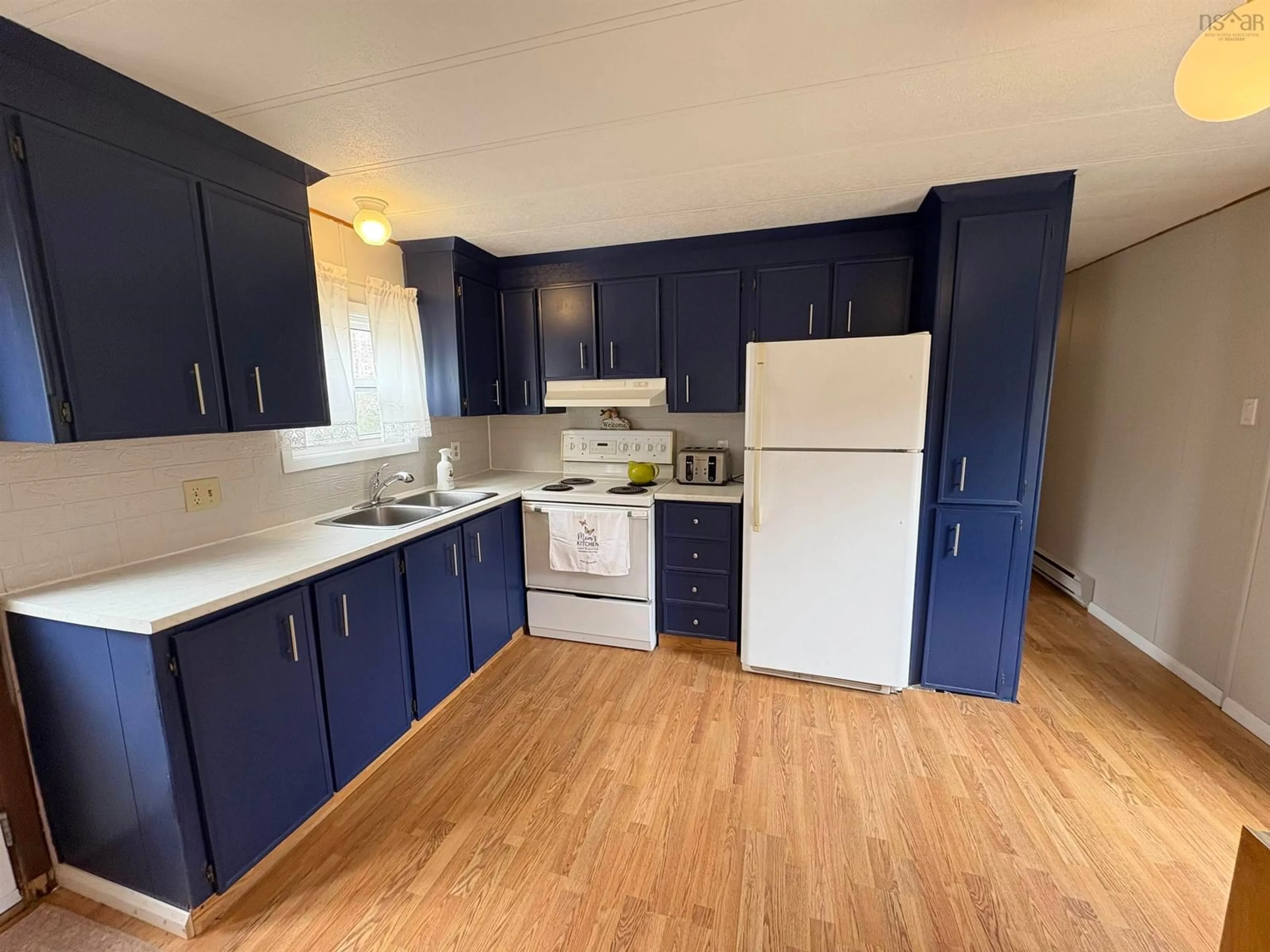 Standard kitchen, wood/laminate floor for 293 Gorman Rd, Afton Nova Scotia B0H 1A0