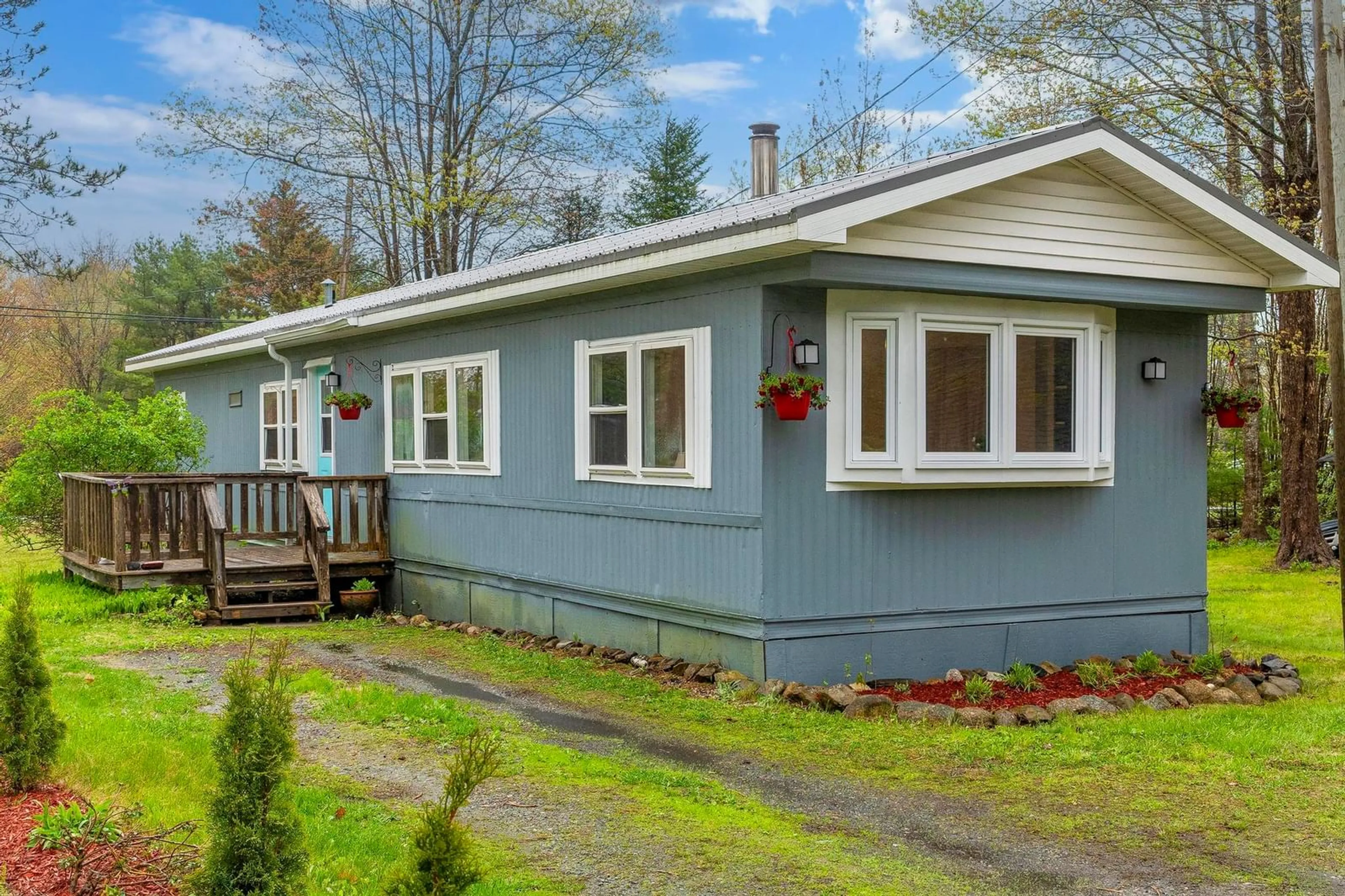Home with vinyl exterior material, street for 7701 Highway 3, Martins River Nova Scotia B0J 2E0