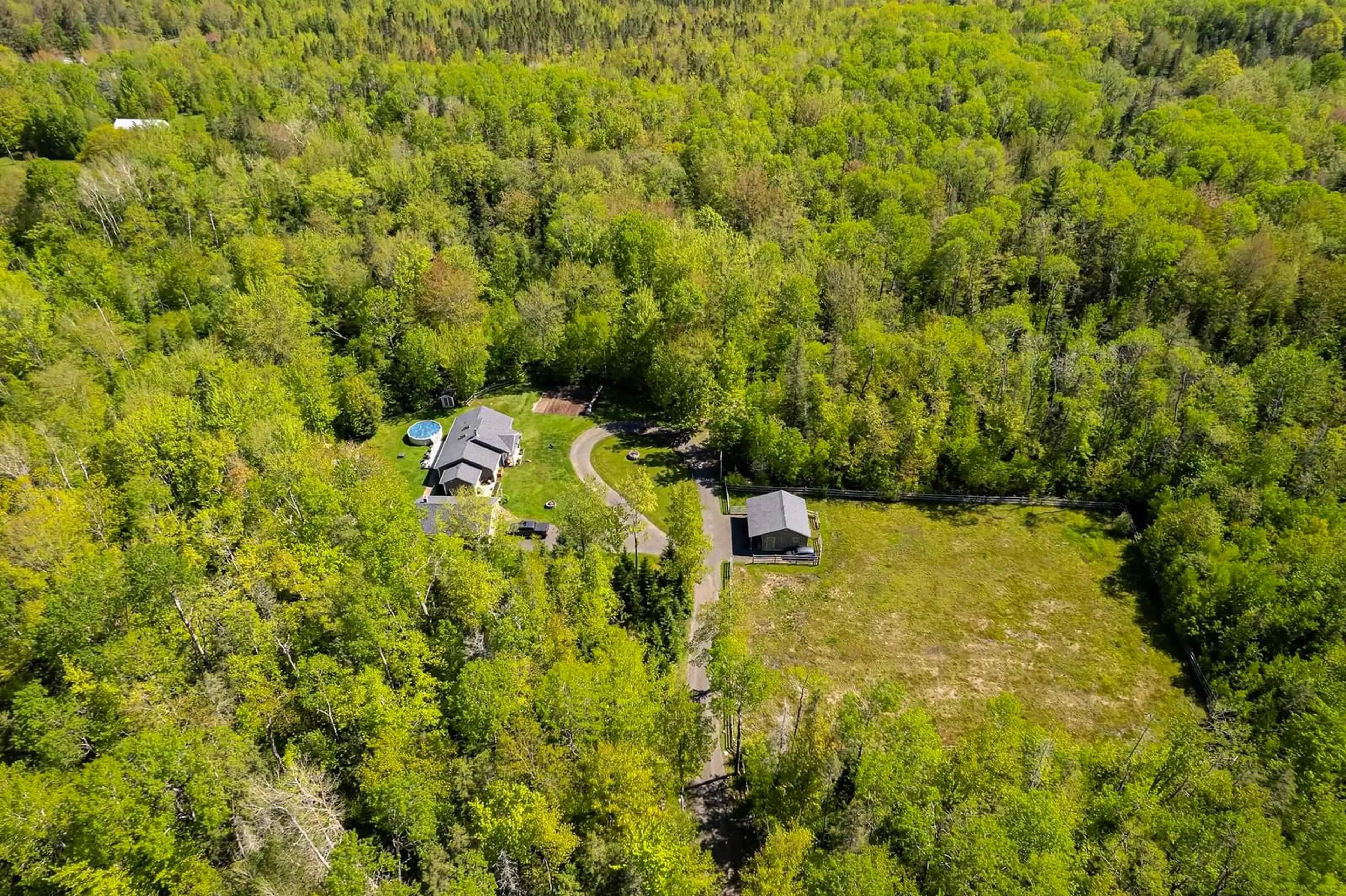 A pic from outside/outdoor area/front of a property/back of a property/a pic from drone, forest/trees view for 188 Fitch Rd, Lawrencetown Nova Scotia B0S 1M0
